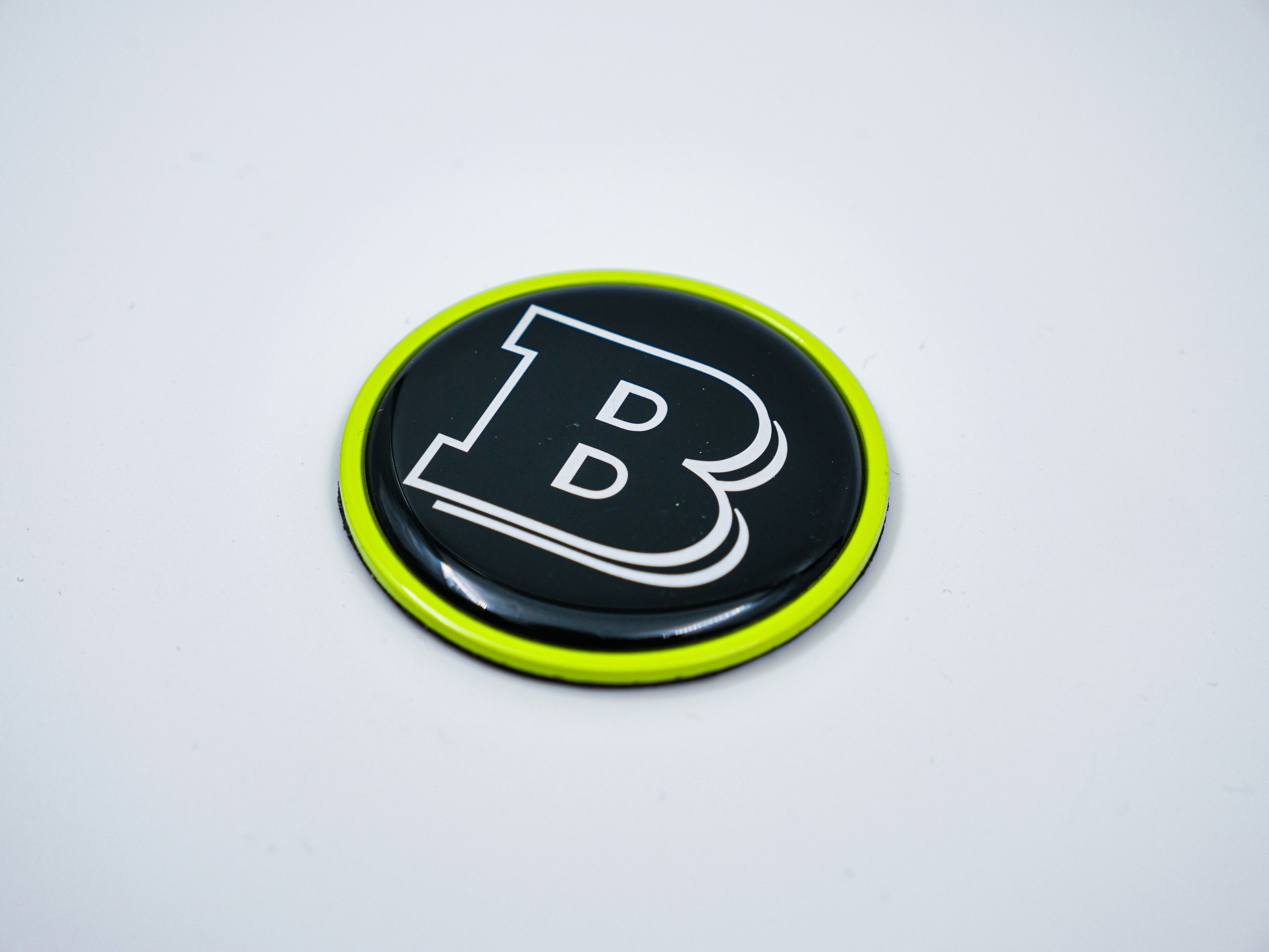 2-component metal lime green Brabus badge logo emblem 55mm for hood scoop of Mercedes-Benz W463, W463A, W464 G-Class - Custom Class