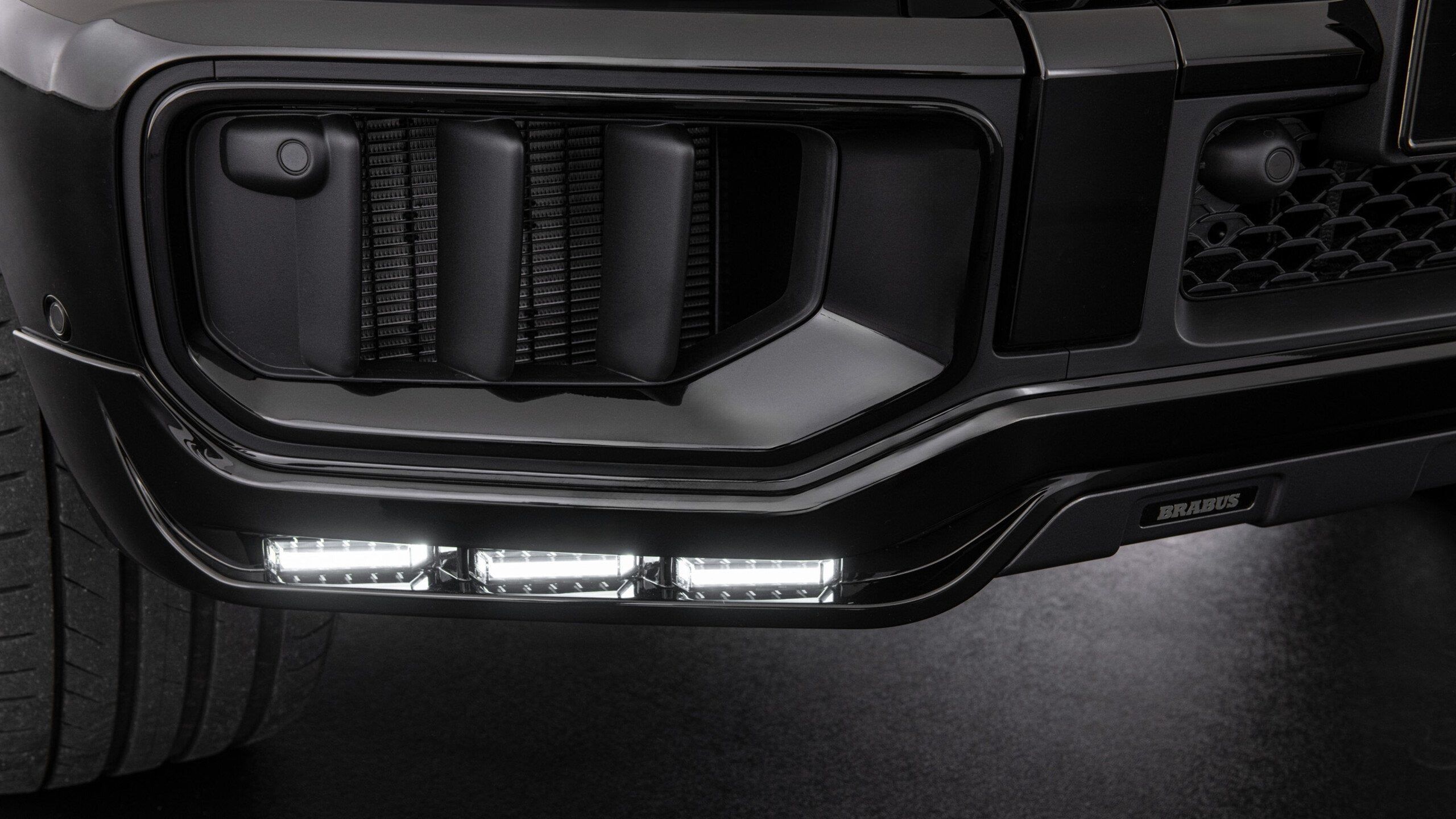 BRABUS Front Bumper Add-On with LED Daytime Running Lights for 2025+ Mercedes G450/G500/G550 W465