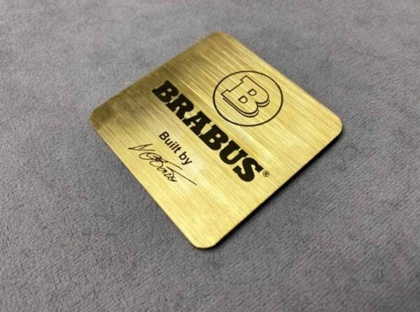 Brabus Style Golden Emblem for Engine Cover, Mercedes-Benz W463/W463A G-Class, premium metal with gold-plated finish.