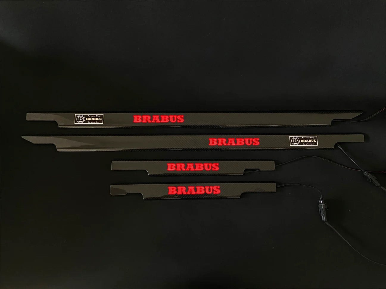 Brabus Door Sills Carbon Red LEDs for Mercedes-Benz G-Class W463, premium carbon fiber finish with illuminated LED logo