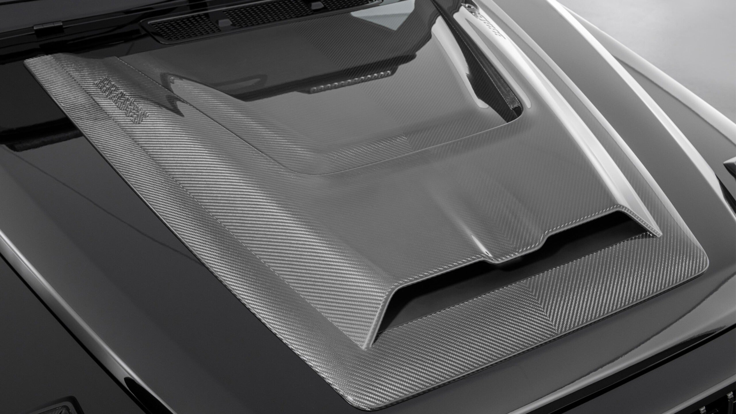 Brabus Carbon Hood Scoop for Mercedes-Benz G-Class W465 (2024+), premium carbon fiber construction.