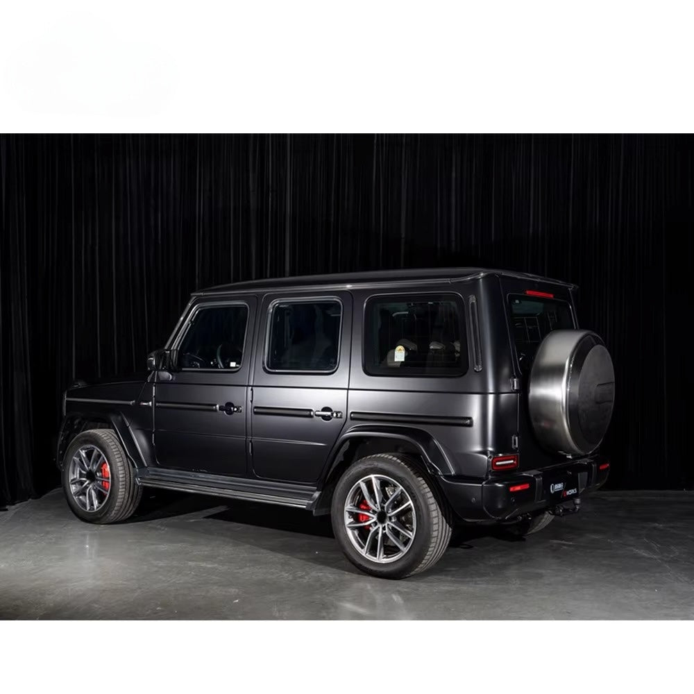 Black SUV on a dark background