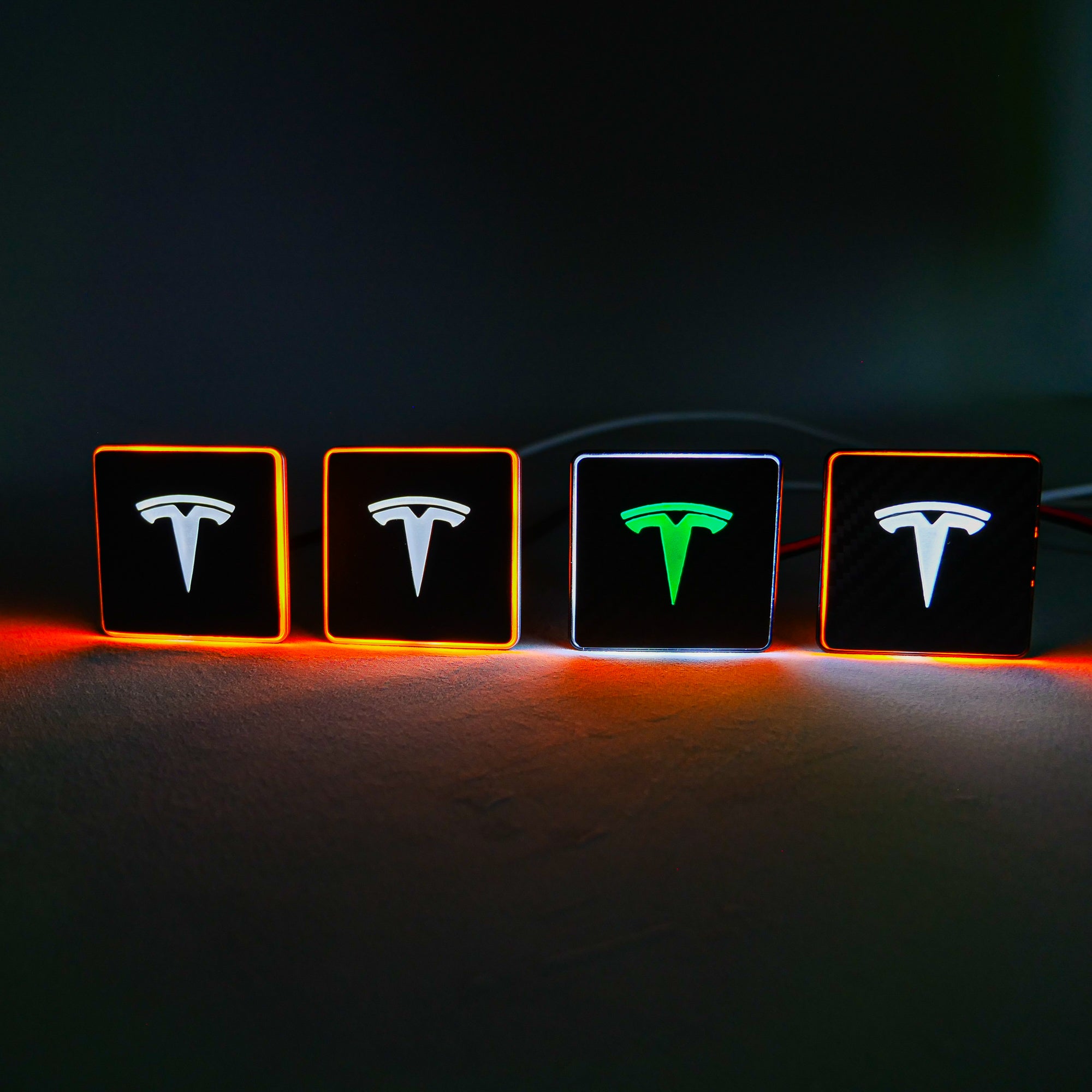 Carbon seat emblems with LED illumination for Tesla Model S, 3, X, Y, and Cybertruck - Custom Class