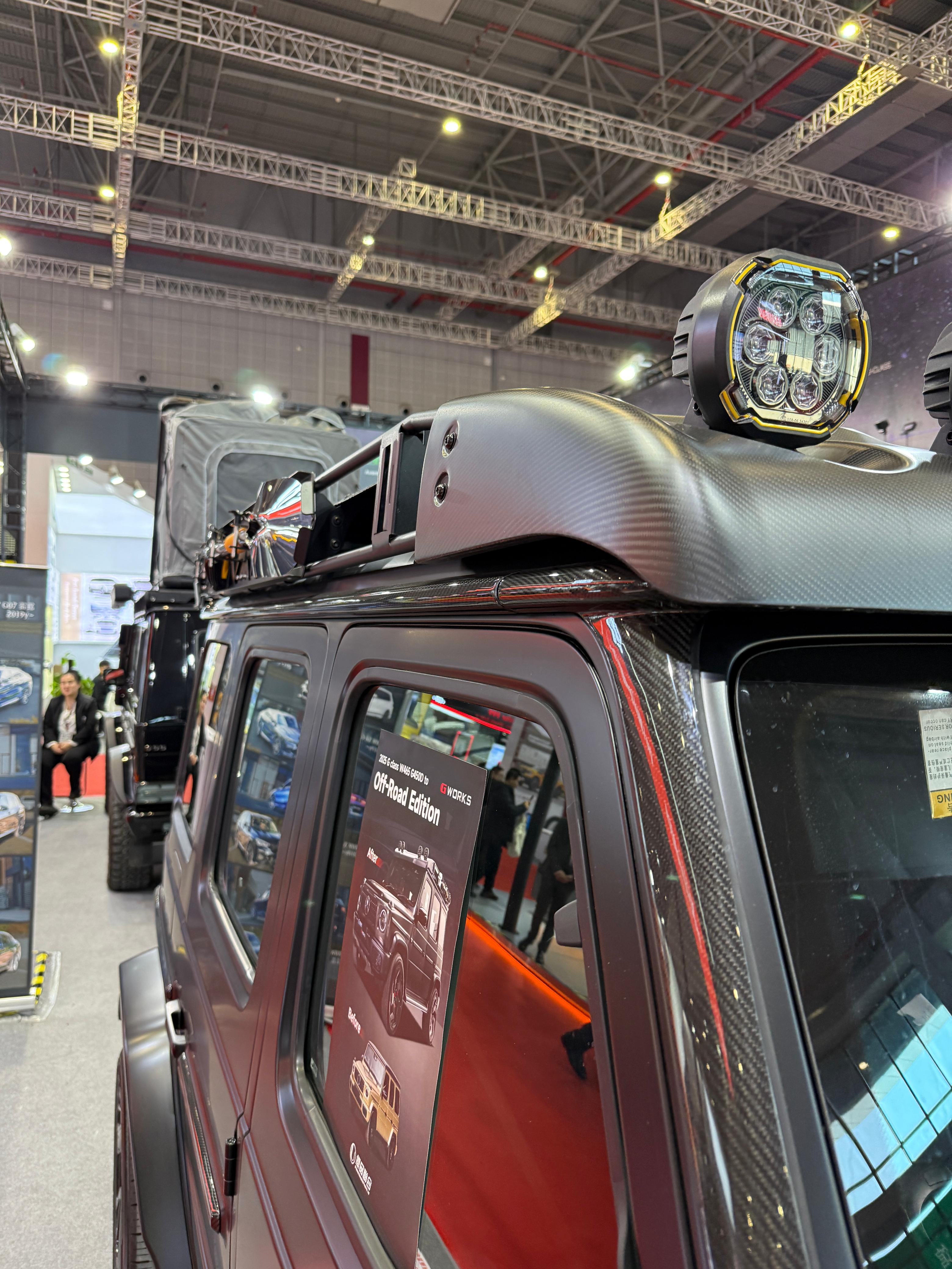 Carbon upper roof trim with A-pillars for Mercedes-Benz G-Class W465 2024+ from Custom Class, featuring premium carbon fiber and a high-gloss finish.