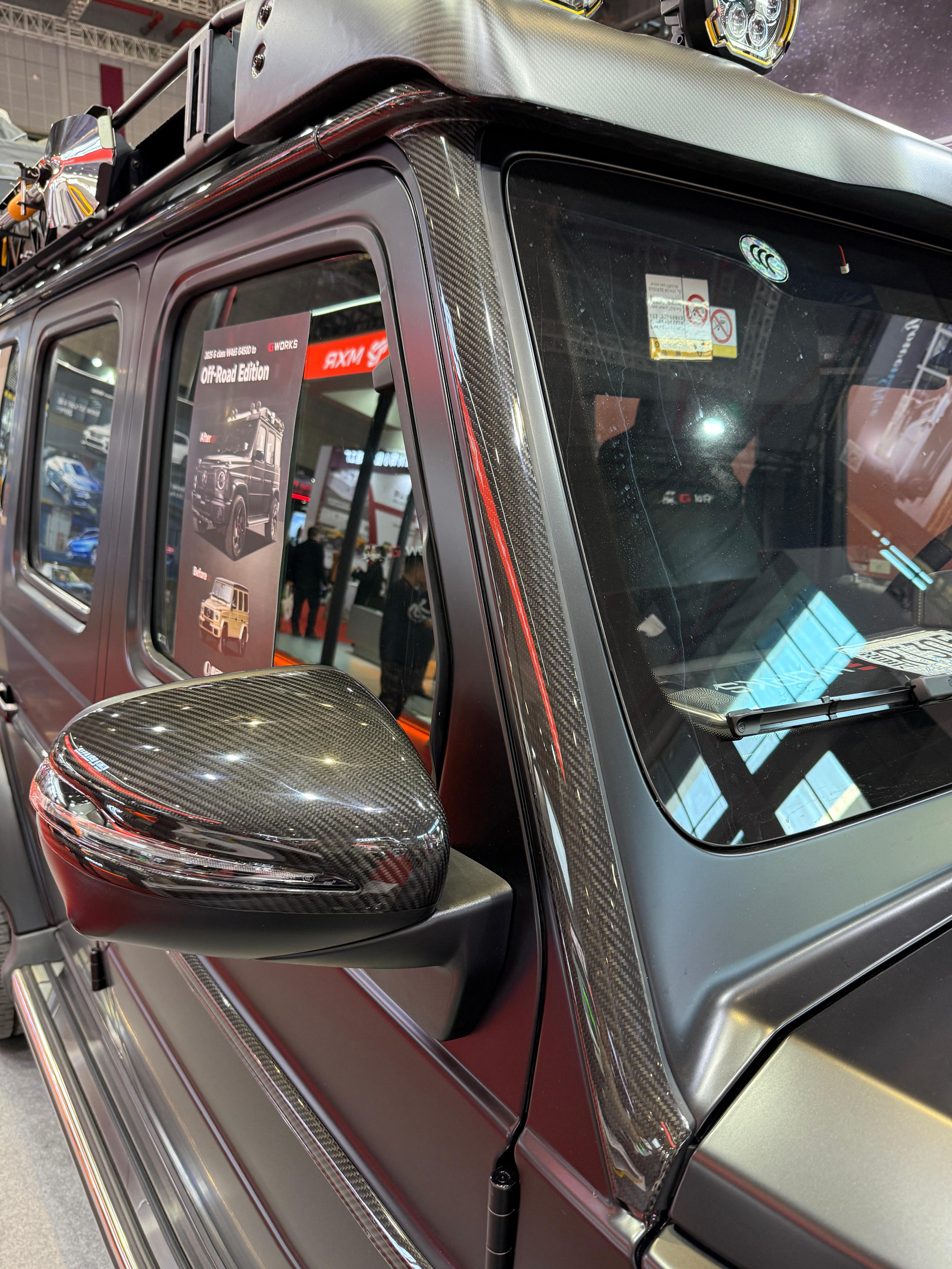 Carbon upper roof trim with A-pillars for Mercedes-Benz G-Class W465 2024+ from Custom Class, featuring premium carbon fiber and a high-gloss finish.