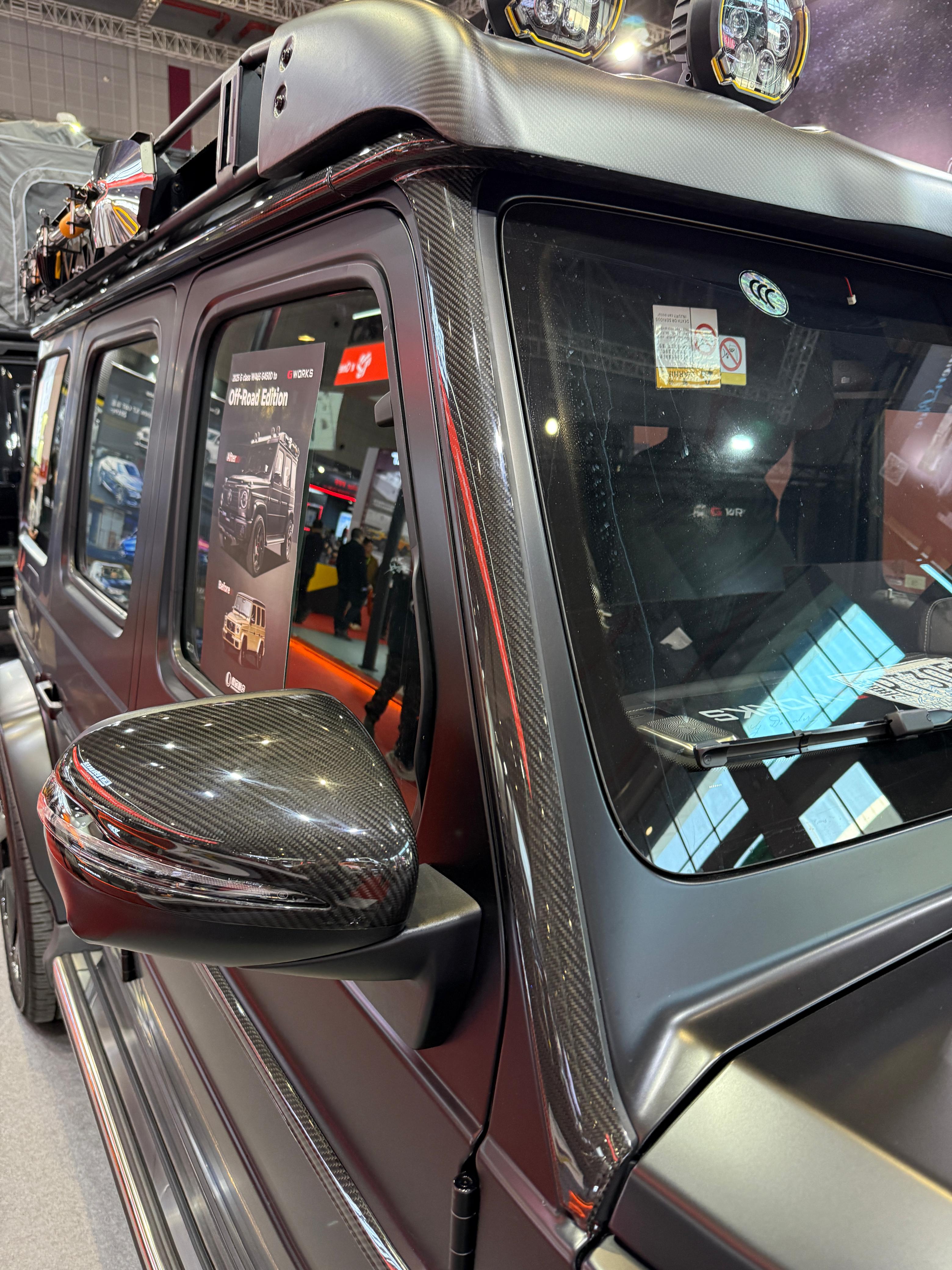 Carbon upper roof trim with A-pillars for Mercedes-Benz G-Class W465 2024+ from Custom Class, featuring premium carbon fiber and a high-gloss finish.