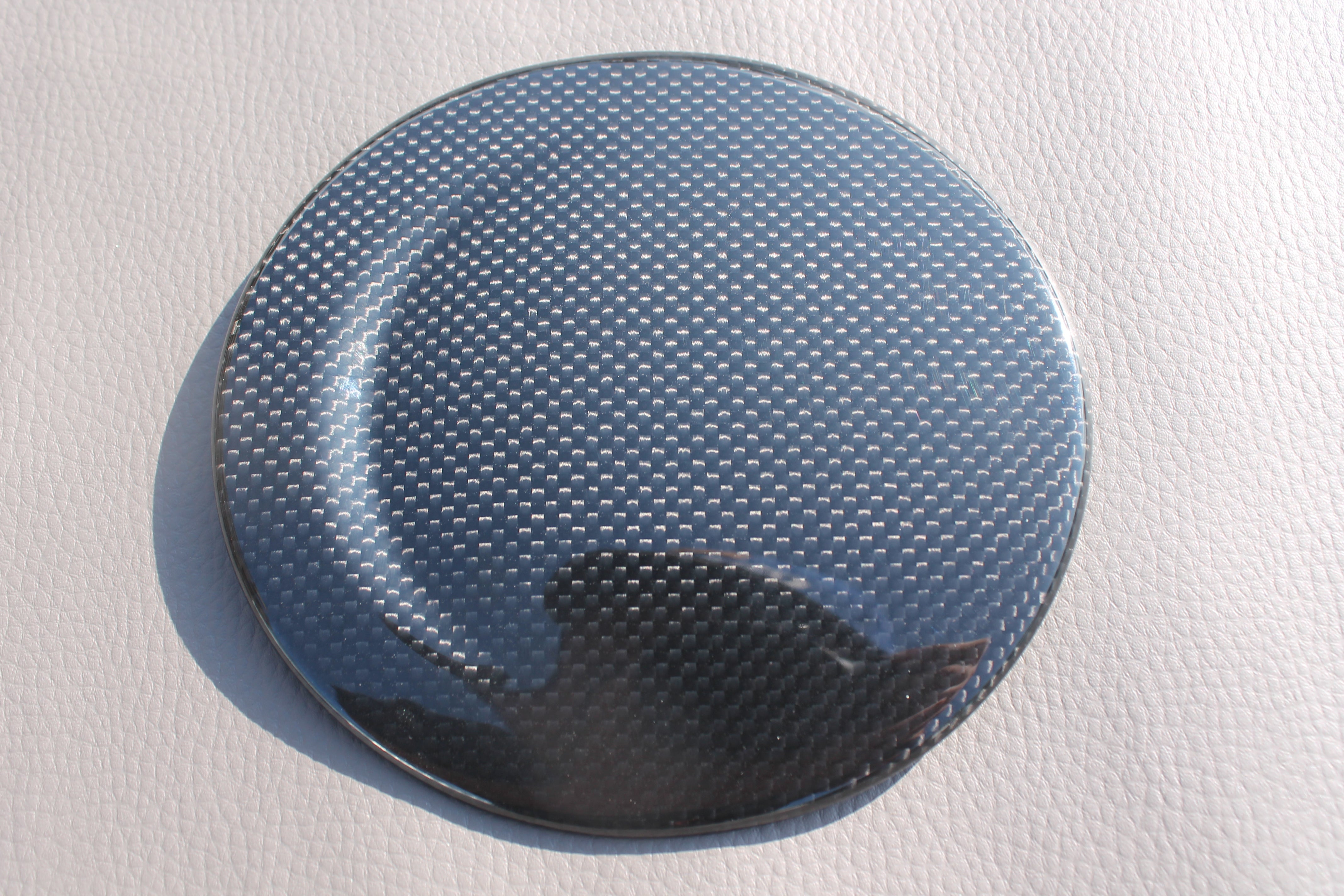 Carbon fiber fuel cap cover for Ferrari 488 GTB 2015-2017 from Custom Class, featuring high-quality carbon construction and a sleek finish.