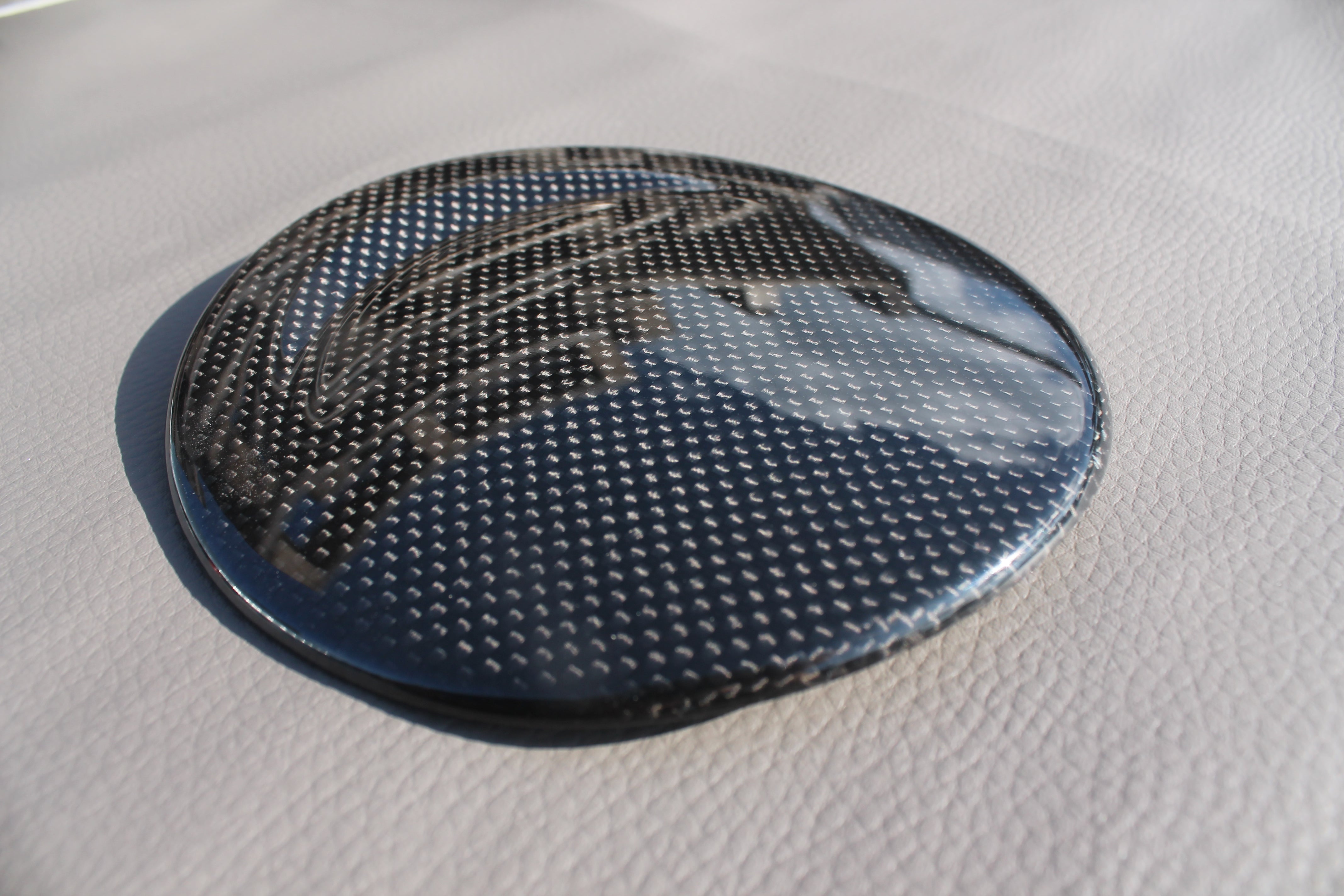 Carbon fiber fuel cap cover for Ferrari 488 GTB 2015-2017 from Custom Class, featuring high-quality carbon construction and a sleek finish.