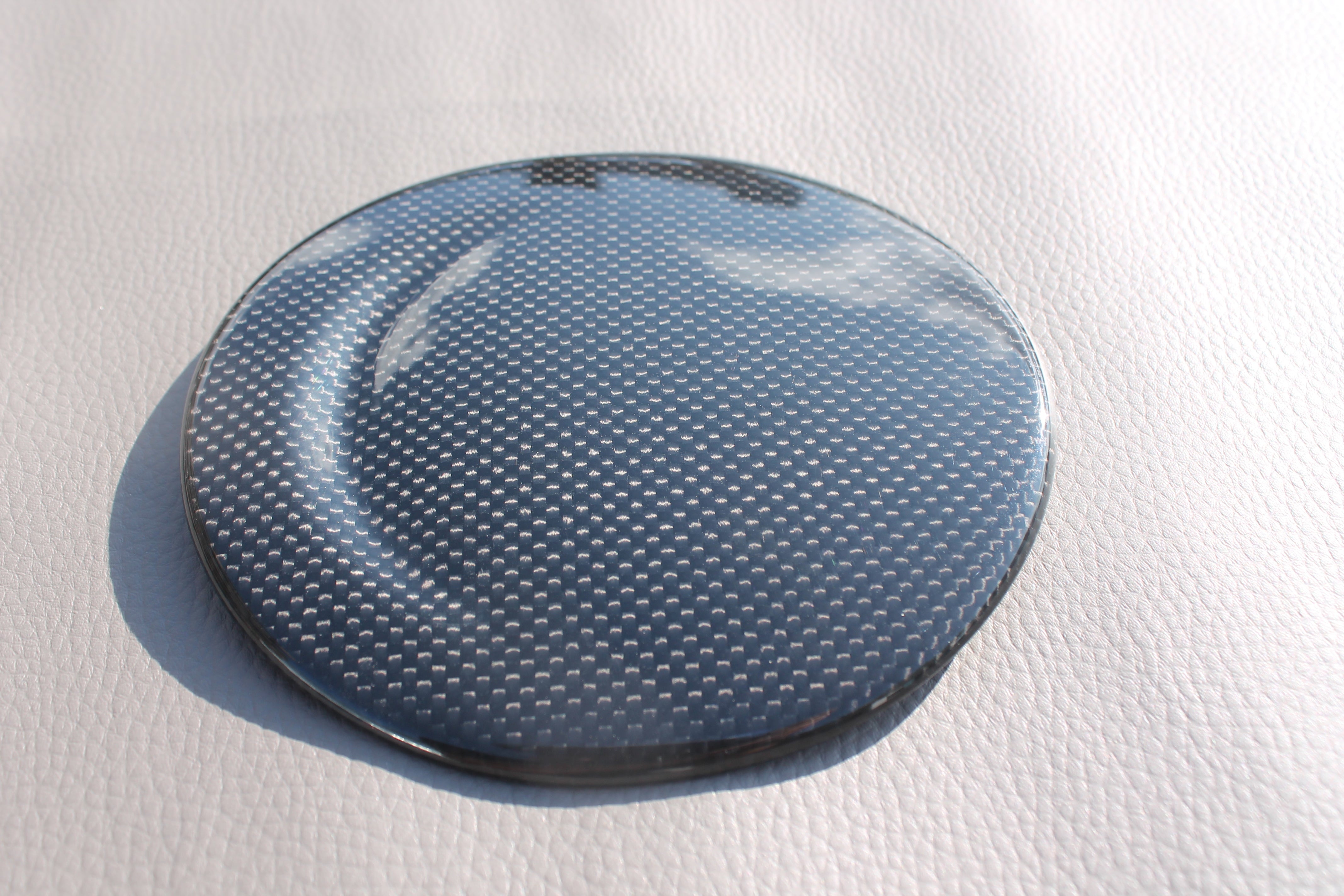 Carbon fiber fuel cap cover for Ferrari 488 GTB 2015-2017 from Custom Class, featuring high-quality carbon construction and a sleek finish.