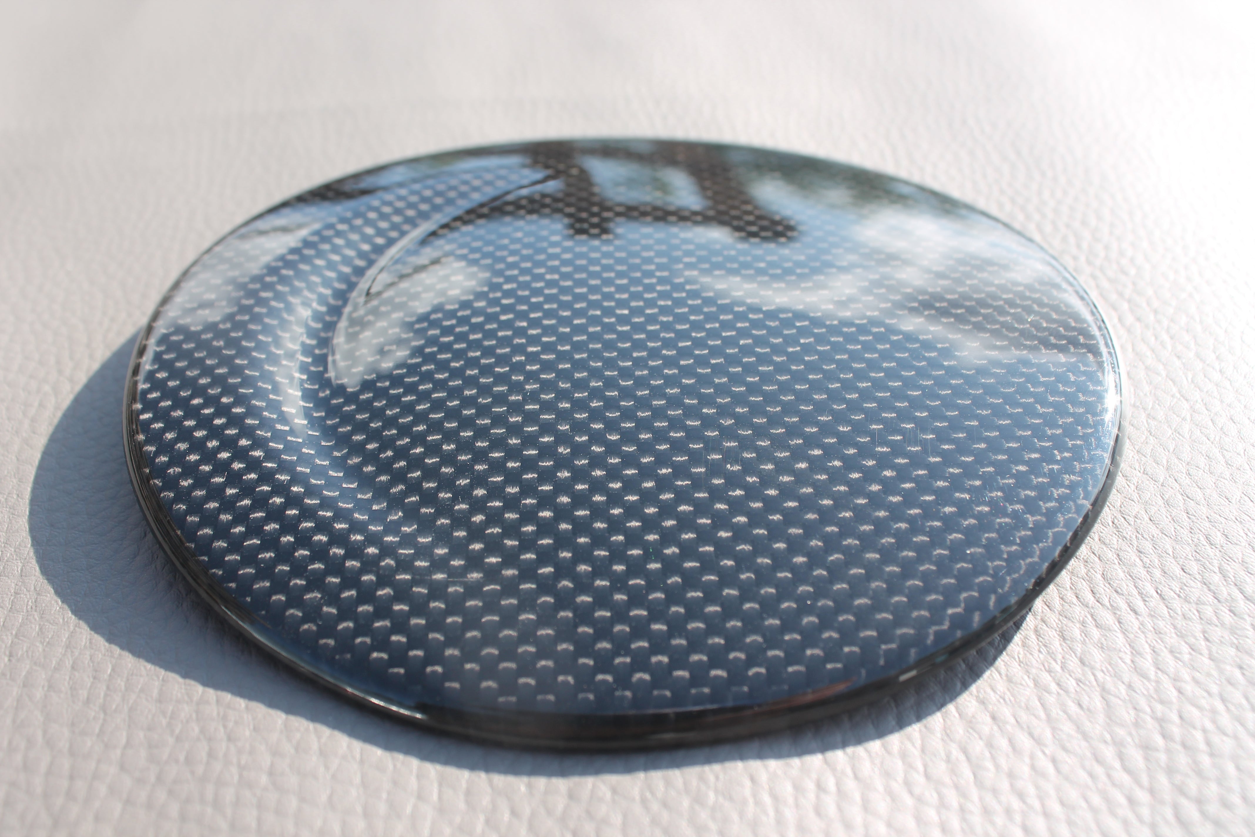 Carbon fiber fuel cap cover for Ferrari 488 GTB 2015-2017 from Custom Class, featuring high-quality carbon construction and a sleek finish.