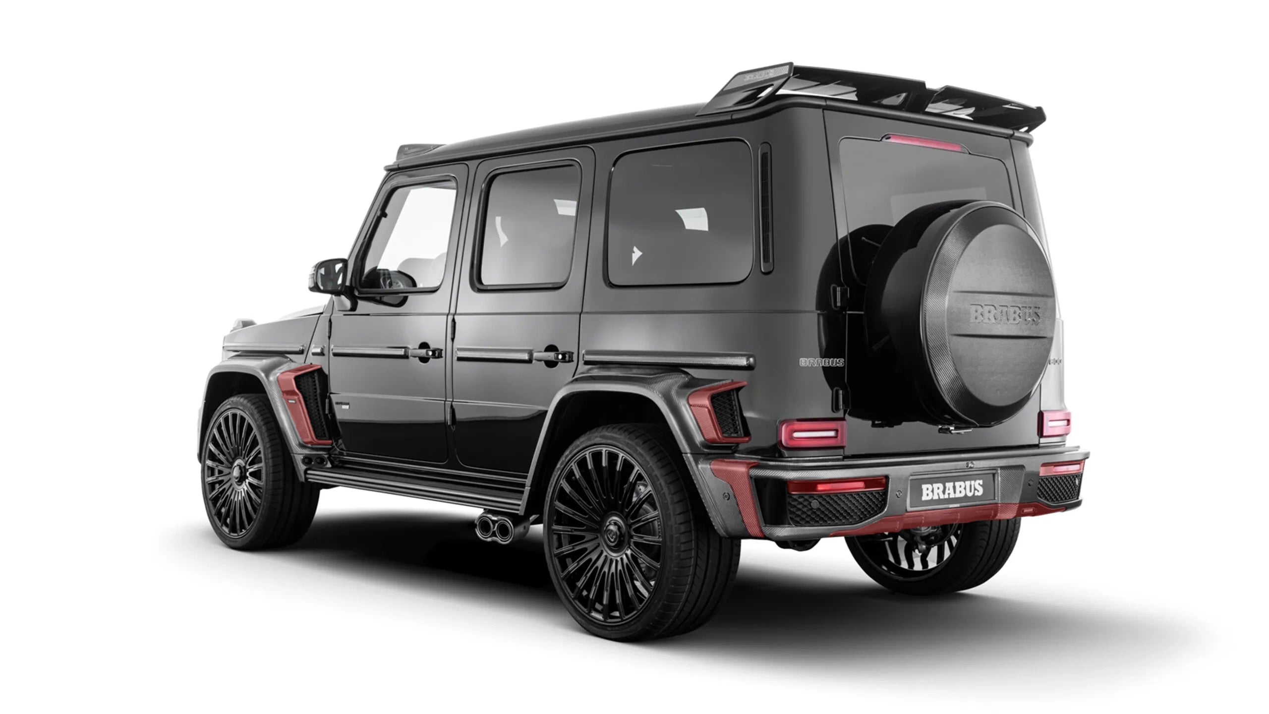 Bespoke G-Wagon W465 customization using Custom Class carbon fiber Widestar-style bumper trim.