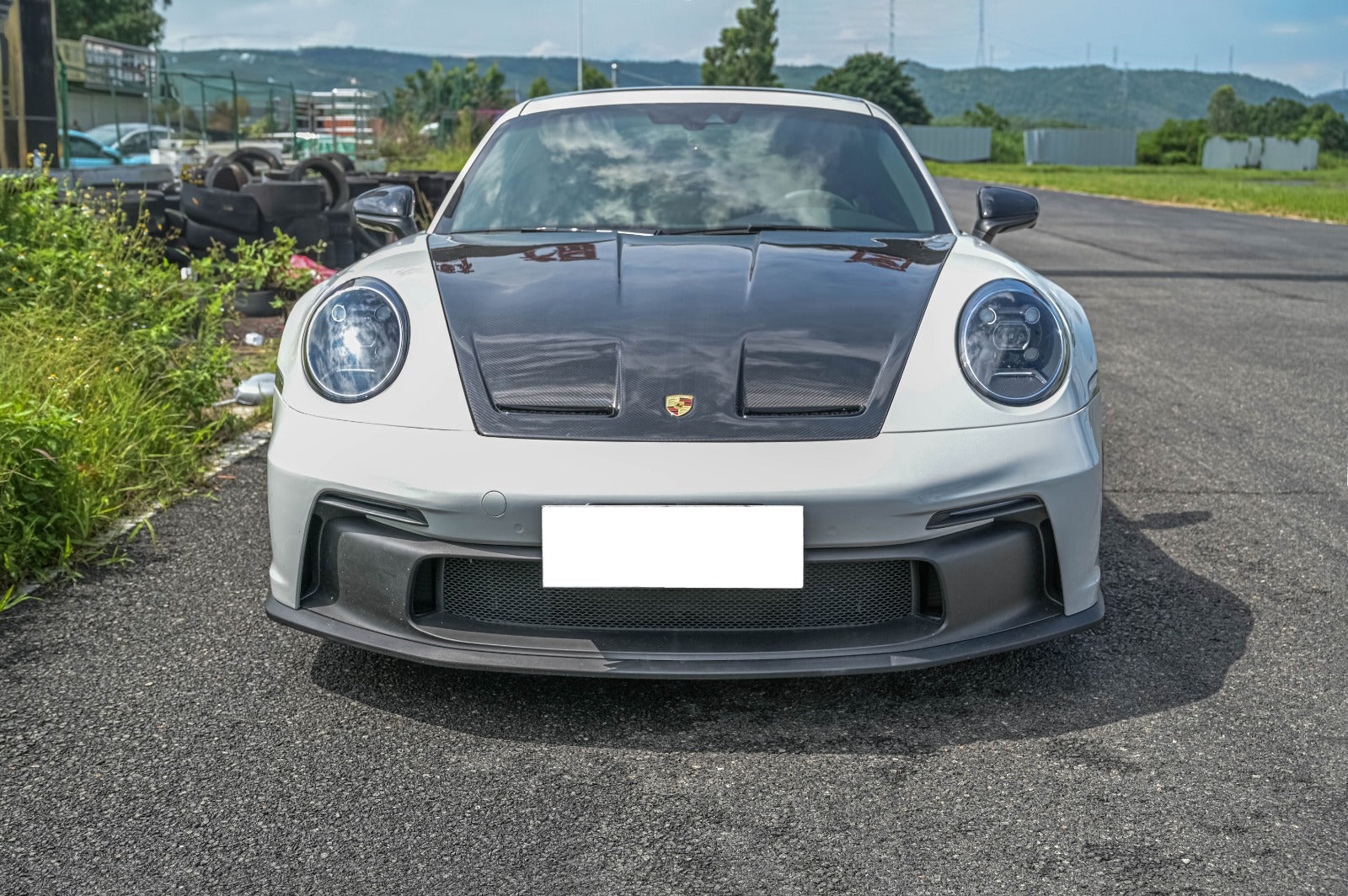 GT3 body kit front view for Porsche 911 992 with carbon fiber hood and aggressive GT3 bumper