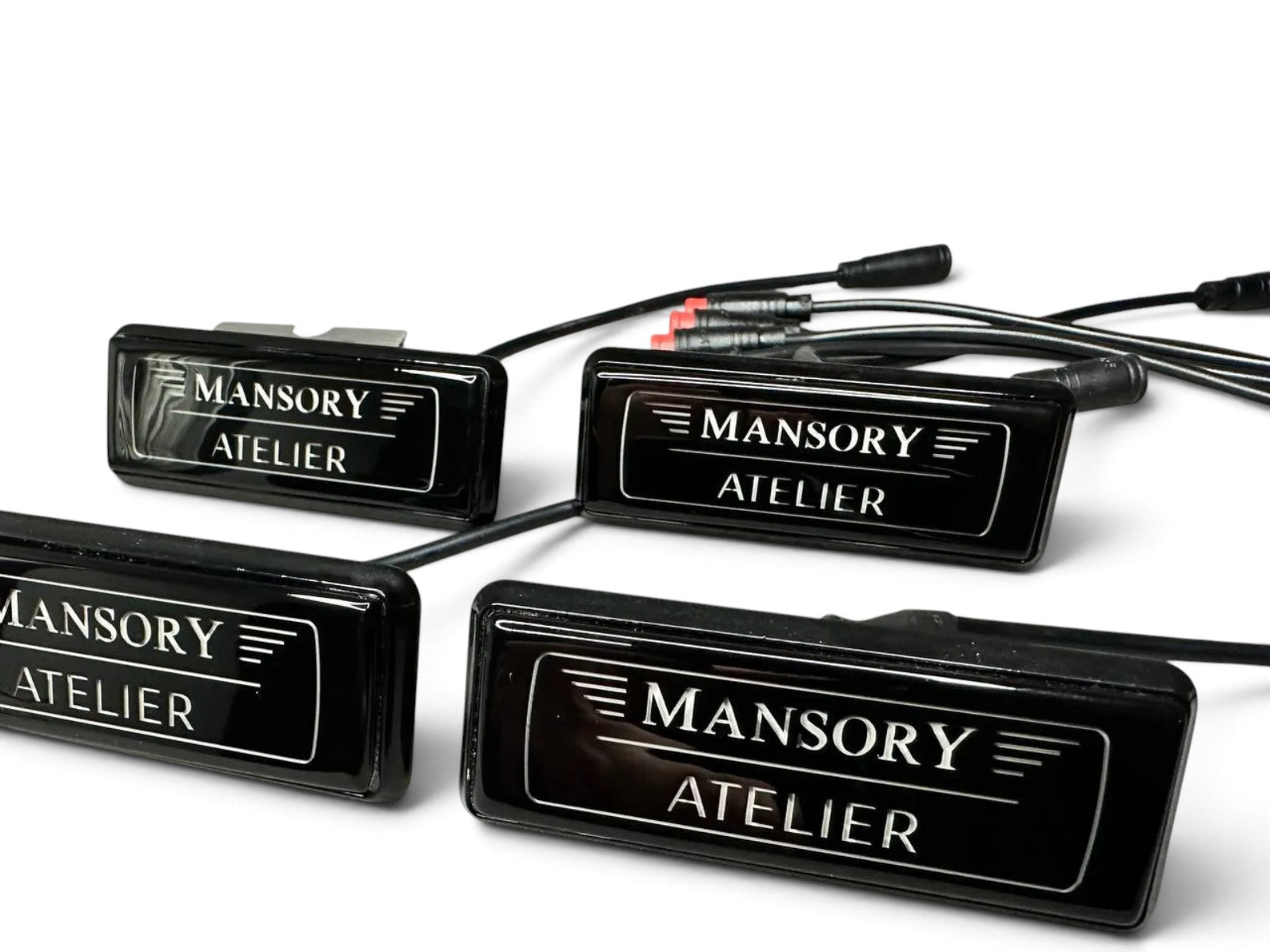 Mansory Style LED illuminated seat badges for custom luxury interior upholstery