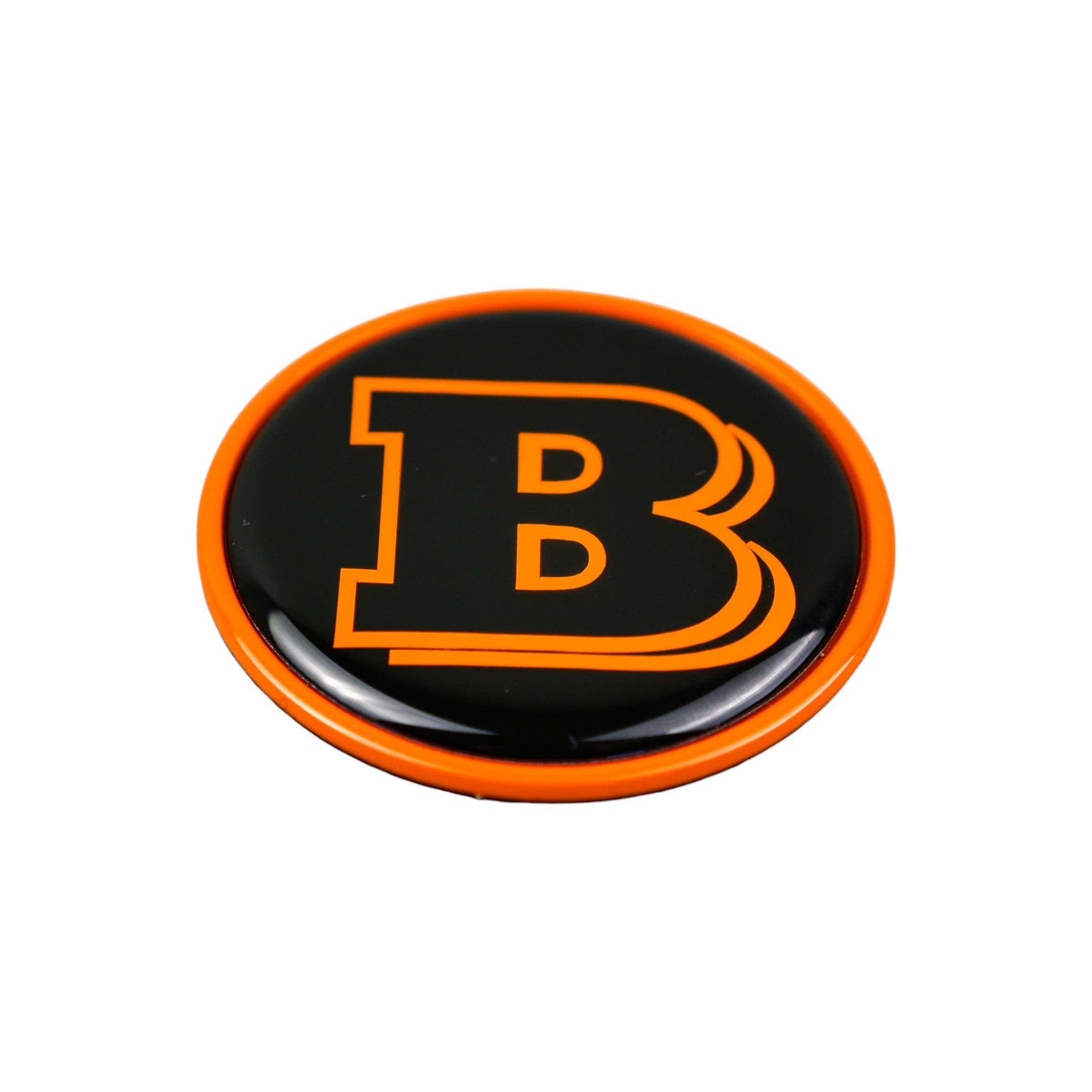 Metal orange Brabus badge logo emblem 55mm for hood scoop of Mercedes G-Class W463, W463A from Custom Class, featuring a two-component metal design with orange and black accents.