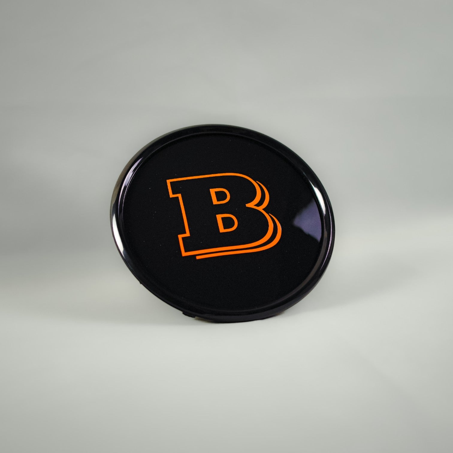 Orange front grille emblem with Brabus logo for Mercedes-Benz W465 2025+ - Custom Class