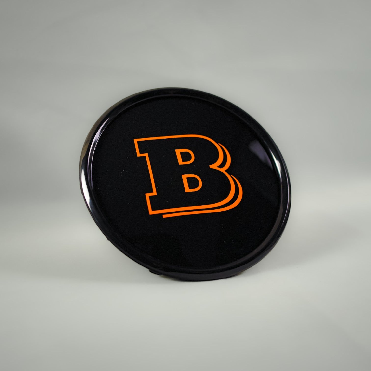 Orange front grille emblem with Brabus logo for Mercedes-Benz W465 2025+ - Custom Class