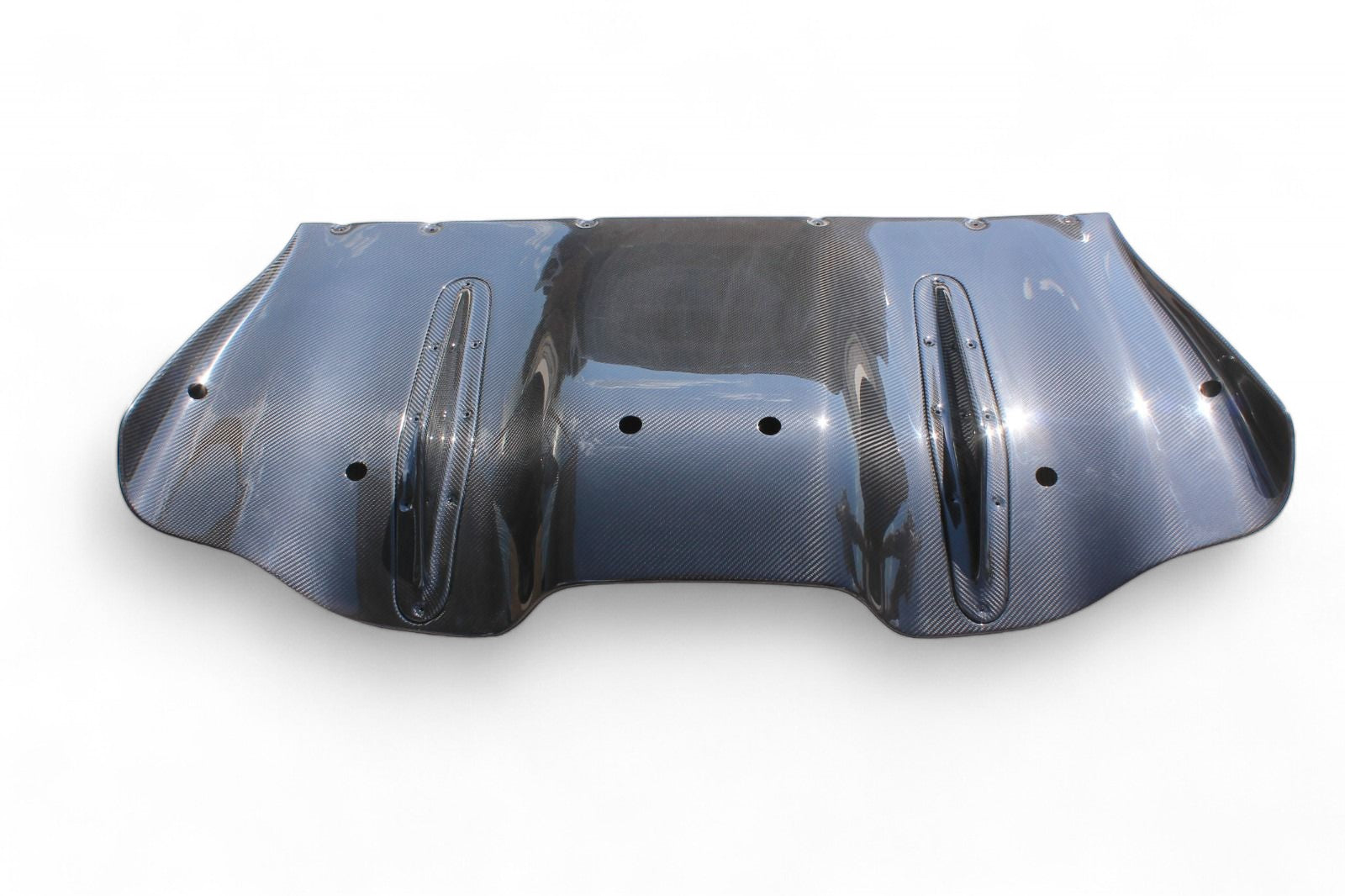 Rear bumper carbon diffuser for Ferrari 458 2009-2015 from Custom Class, crafted from genuine carbon fiber with a high-gloss UV protective varnish.