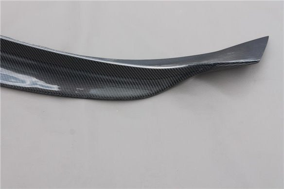 Rear trunk carbon spoiler for Maserati Quattroporte Ghibli 2013+ from Custom Class, made of genuine carbon fiber with a high-gloss UV-resistant coating.