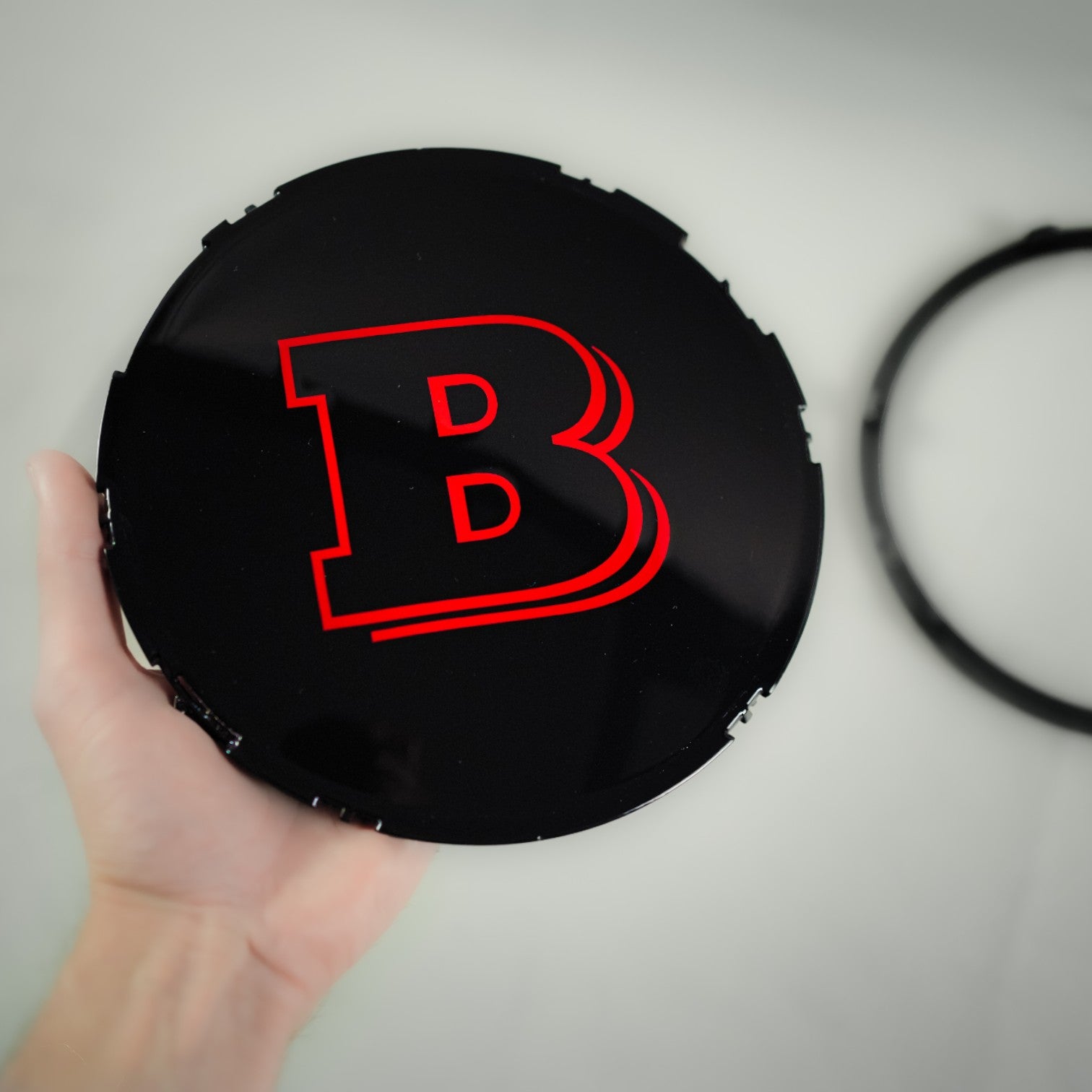 Red front grille emblem with Brabus logo for Mercedes-Benz W465 2025+ - Custom Class