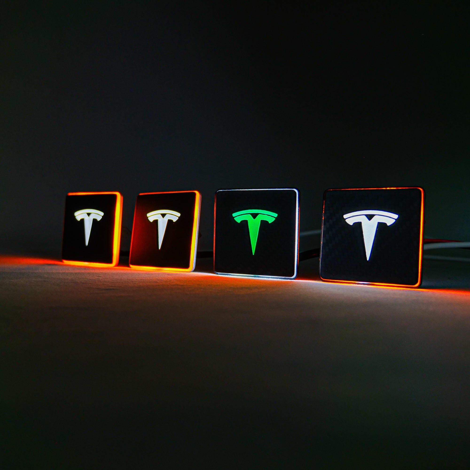 LED-illuminated seat emblems for Tesla Model S, Model 3, Model X, Model Y, and Cybertruck, available in customizable LED colors for front and rear seats.