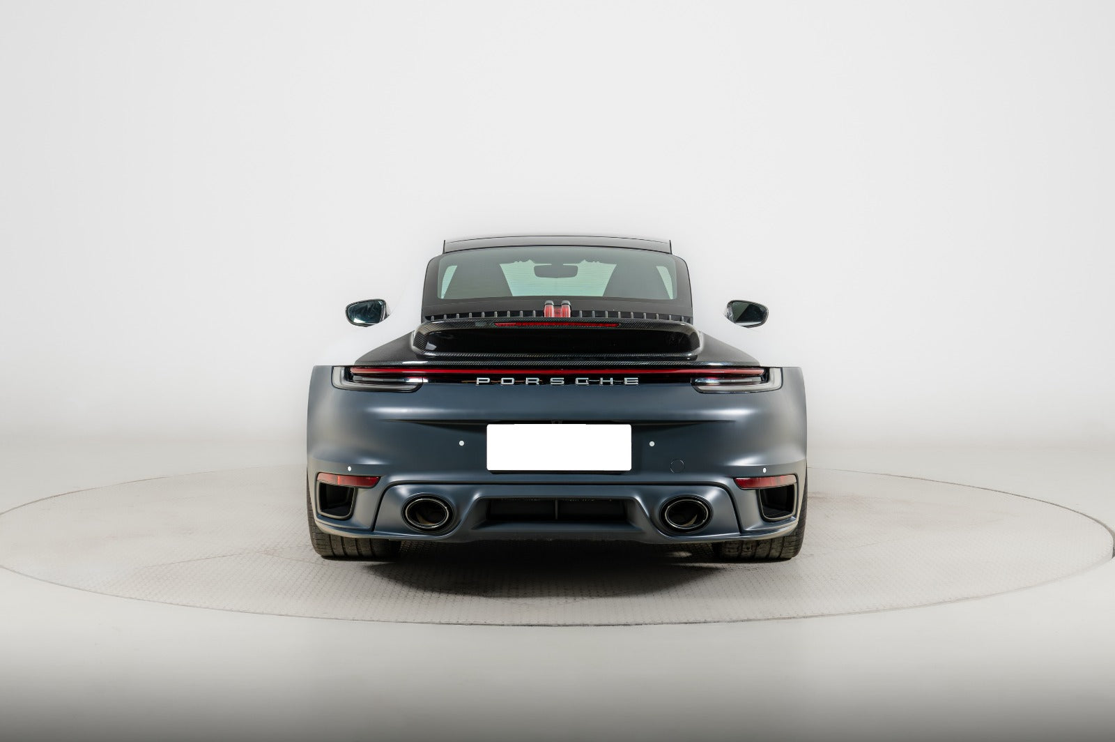 Turbo SD body kit rear view for Porsche 911 992 with carbon fiber spoiler and aggressive diffuser
