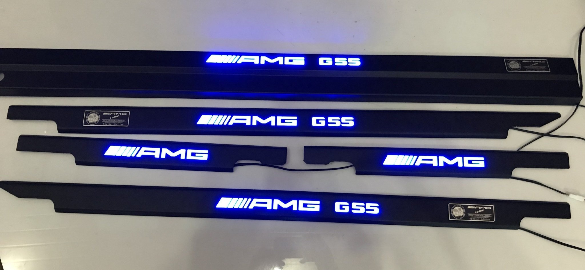 AMG G55 LED Illuminated Door Sills 4 or 5 pcs for Mercedes-Benz G-Class W463 from Custom Class, featuring stainless steel construction and LED illumination.