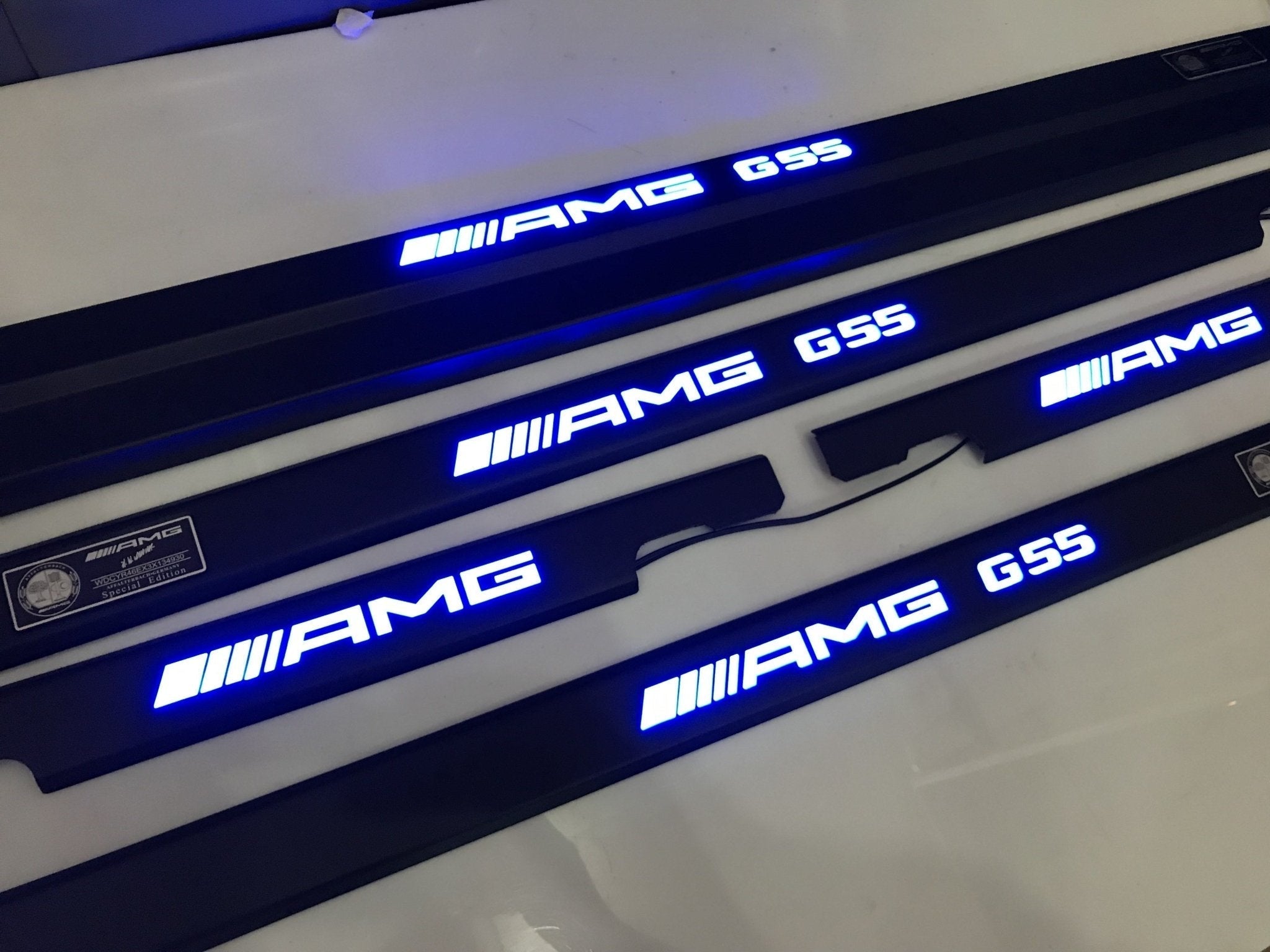 AMG G55 LED Illuminated Door Sills 4 or 5 pcs for Mercedes-Benz G-Class W463 from Custom Class, featuring stainless steel construction and LED illumination.