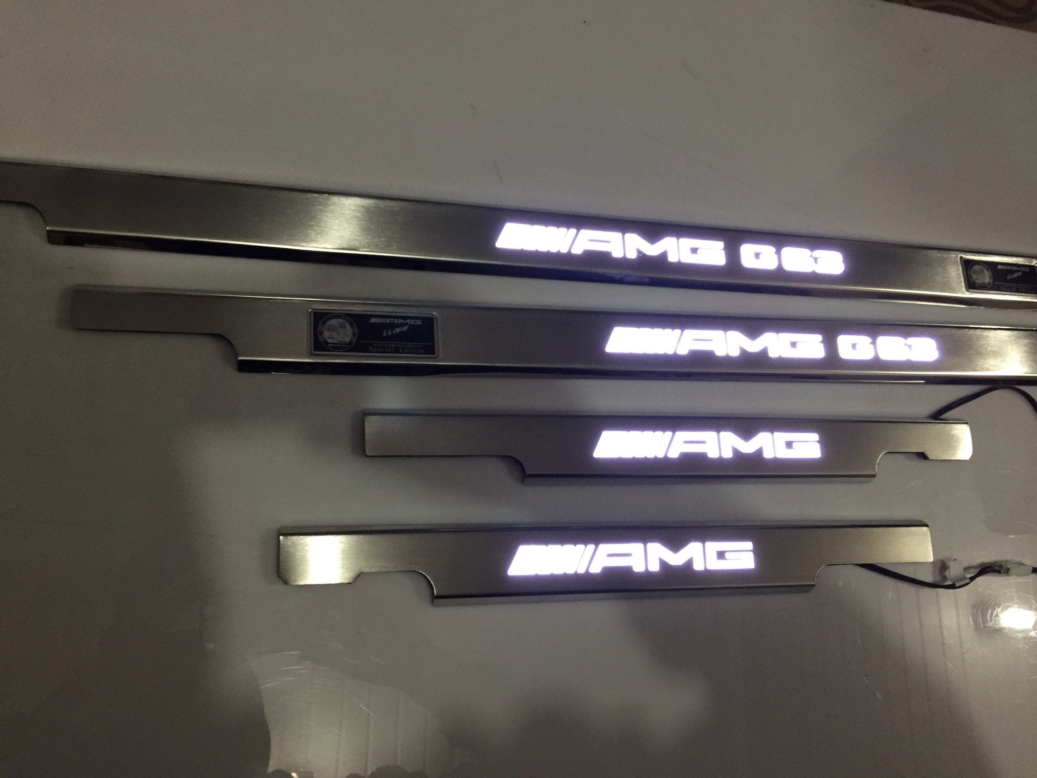 AMG G63 LED Illuminated Door Sills 4 or 5 pcs for Mercedes-Benz G-Class W463 from Custom Class, crafted from stainless steel with LED illumination.