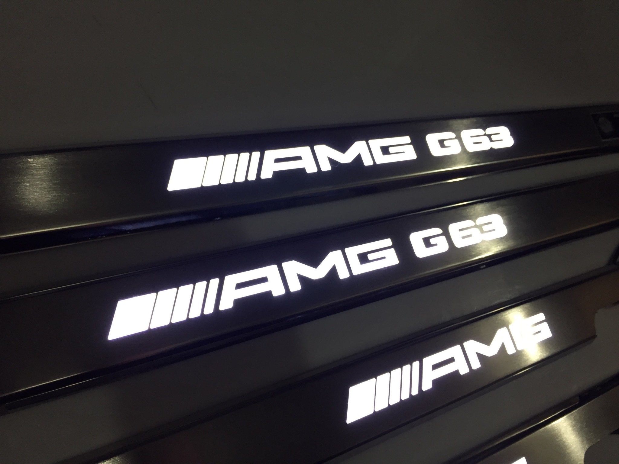 AMG G63 LED Illuminated Door Sills 4 or 5 pcs for Mercedes-Benz G-Class W463 from Custom Class, crafted from stainless steel with LED illumination.