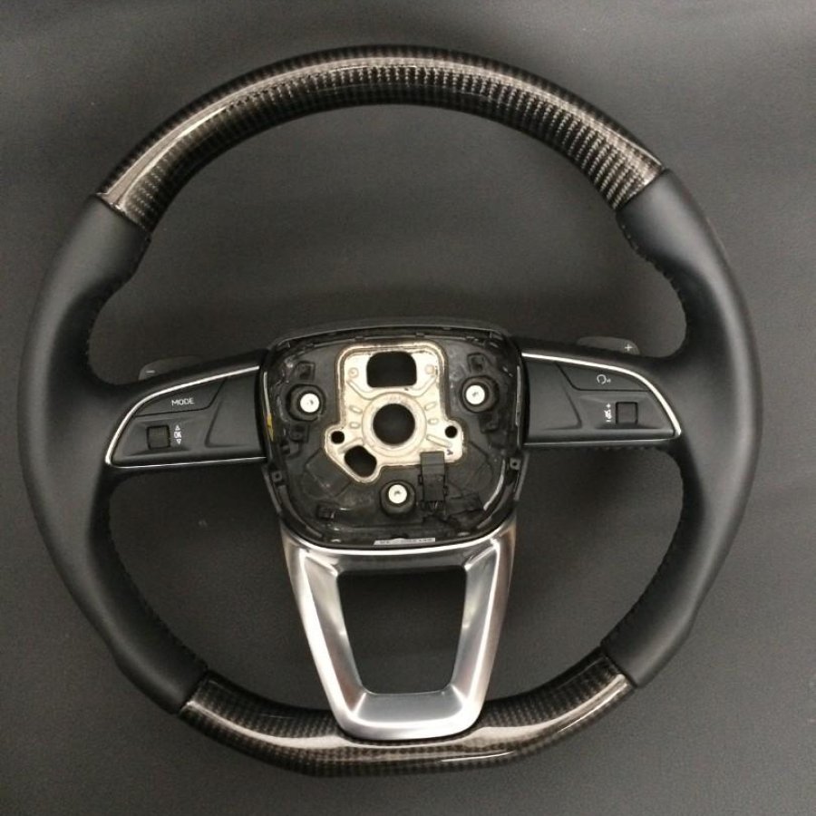 OEM remanufactured Audi Q7 steering wheel with carbon fiber, black leather, flat bottom, and stock paddle shifts from Custom Class.