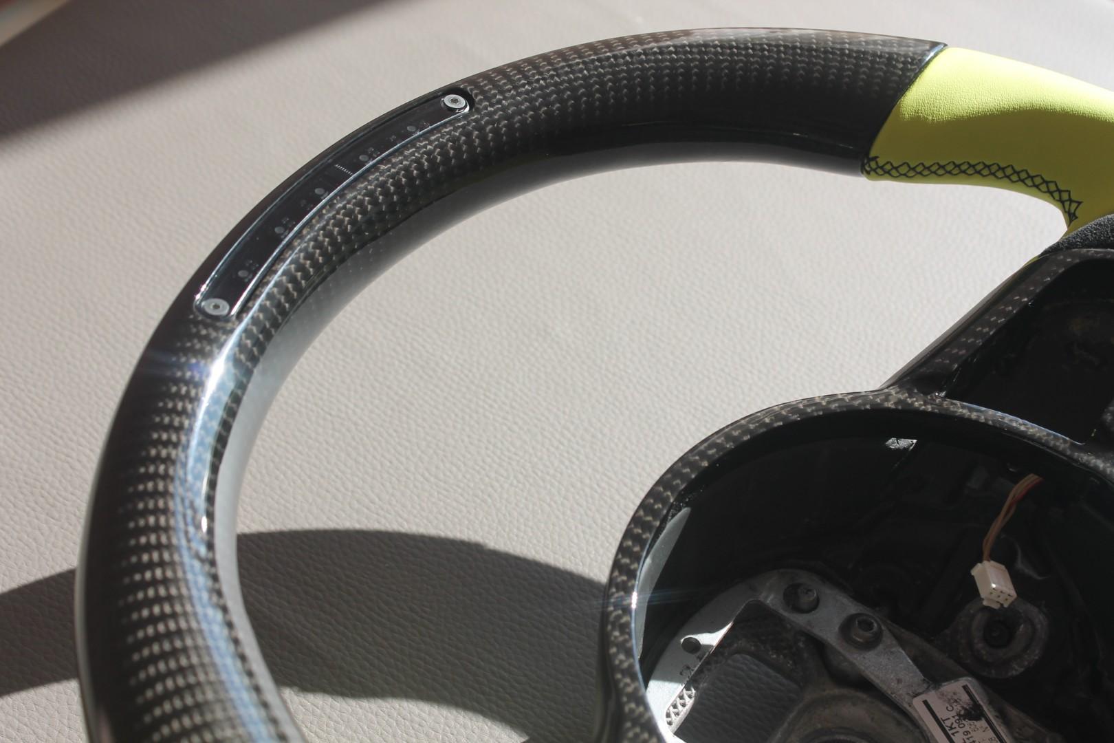 OEM remanufactured Audi R8 steering wheel with carbon fiber, yellow leather, alcantara, flat bottom, and LED panel from Custom Class.