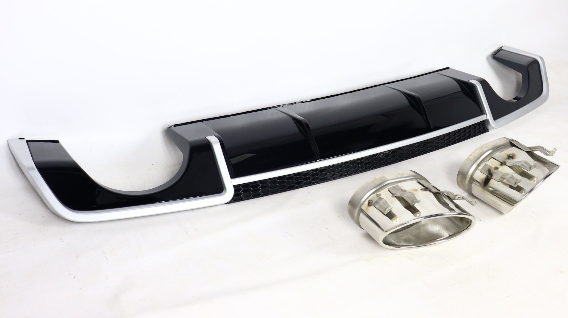 RS3 rear diffuser with exhaust tips for Audi A3 sedan 2012-2015 from Custom Class, featuring a black finish.