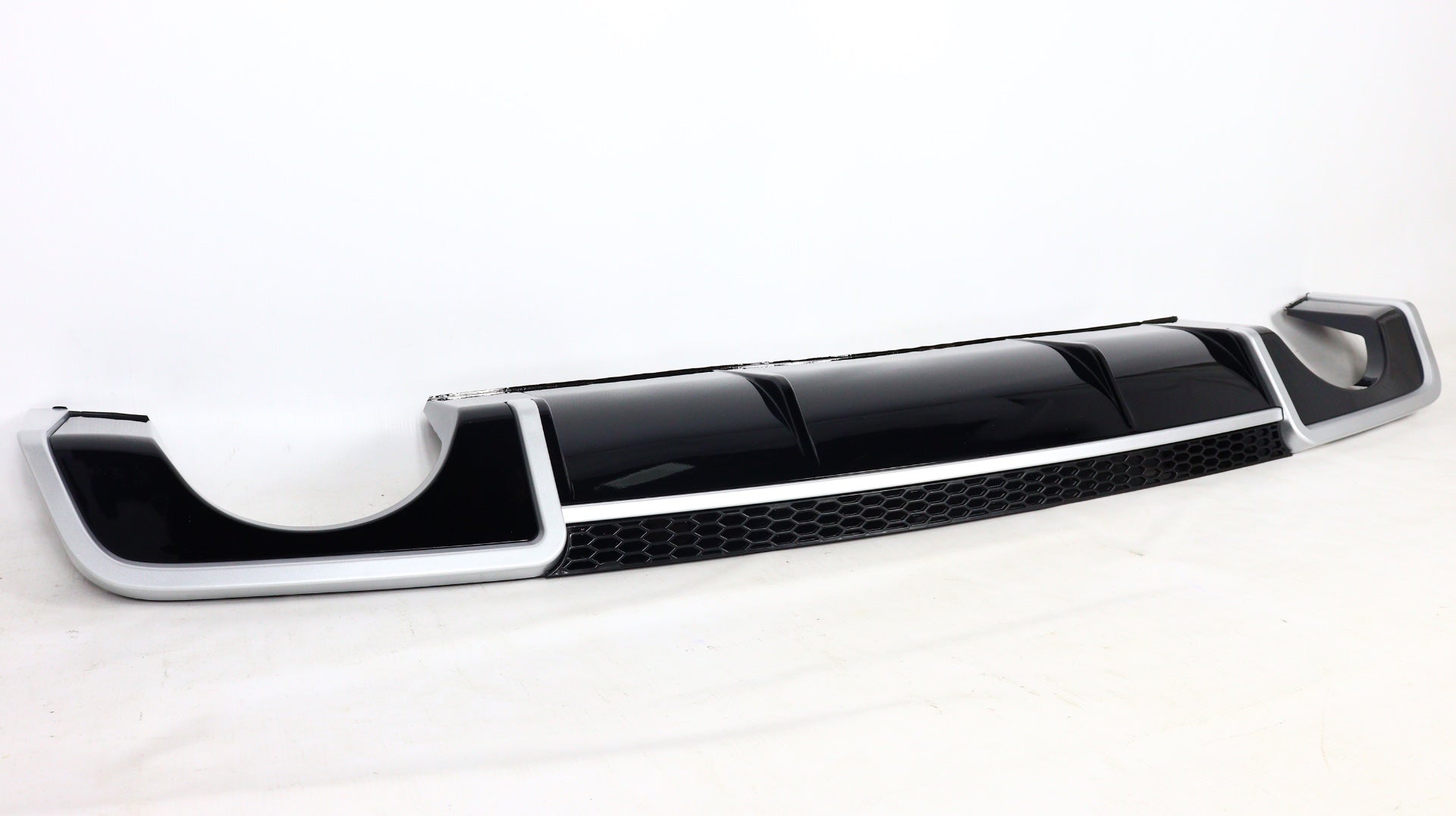 RS3 rear diffuser with exhaust tips for Audi A3 sedan 2012-2015 from Custom Class, featuring a black finish.