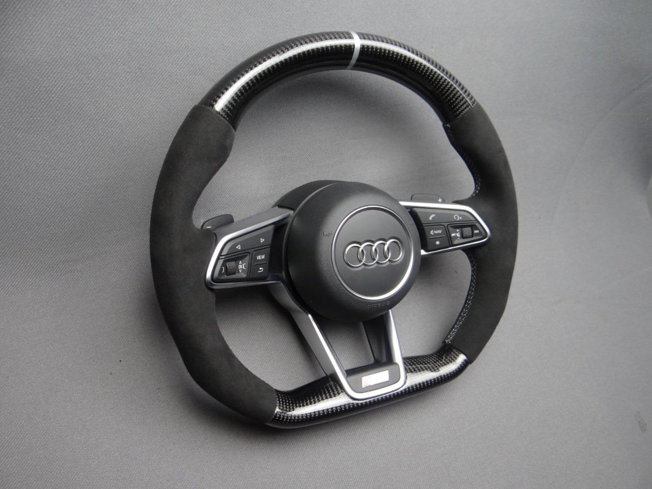 OEM remanufactured Audi TT R8 steering wheel with carbon fiber, alcantara, flat bottom, and white 12 o'clock stripe from Custom Class.