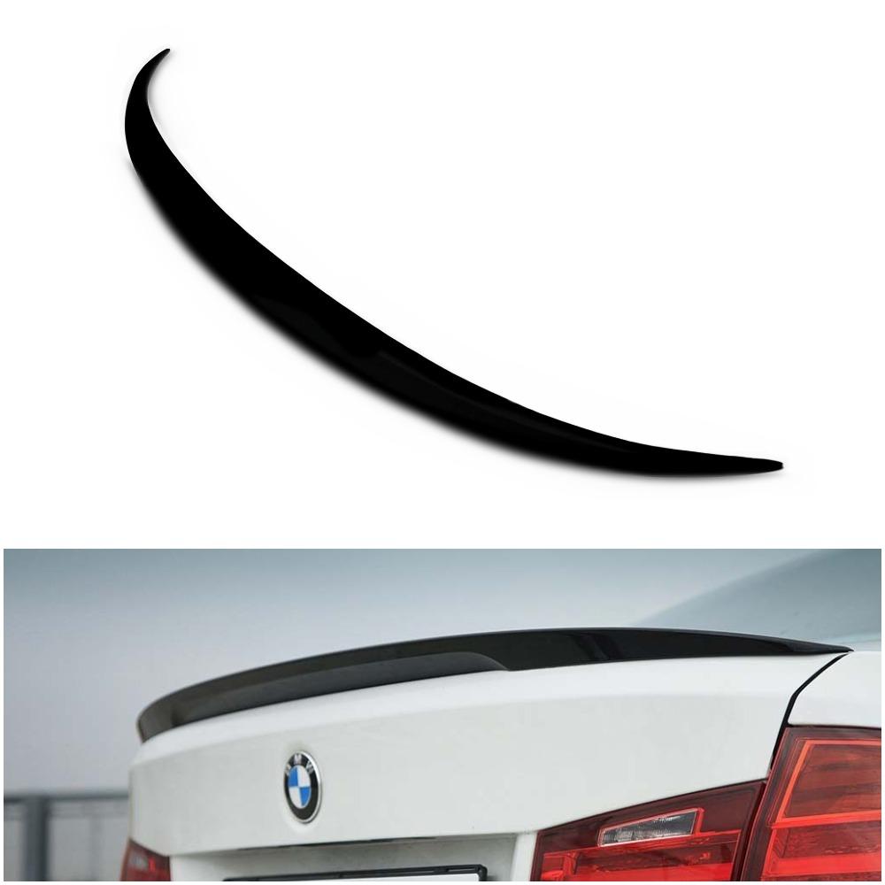 Rear fiberglass spoiler for BMW F30 from Custom Class, designed for a sporty and aerodynamic rear profile.