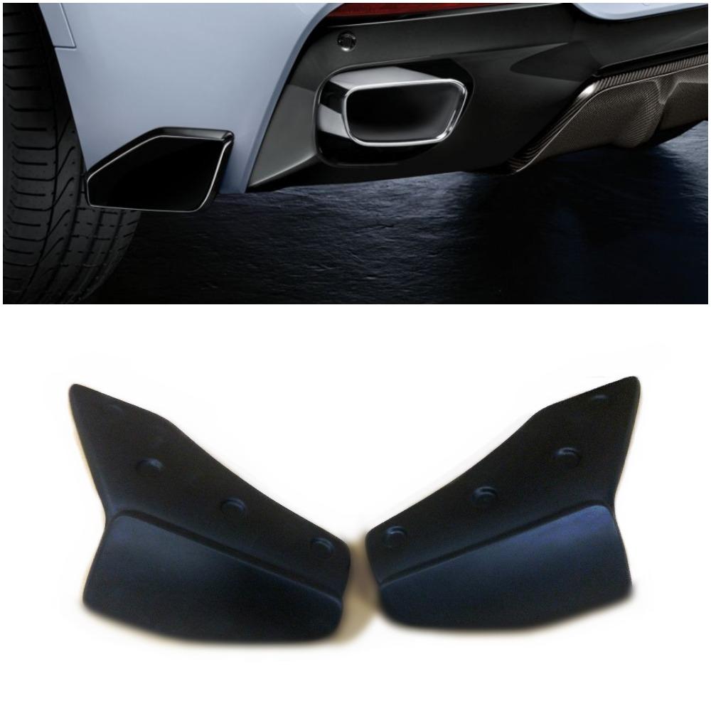 Fiberglass side fangs for rear bumper BMW X5 F15 from Custom Class, designed for a sporty and aggressive rear-end appearance.