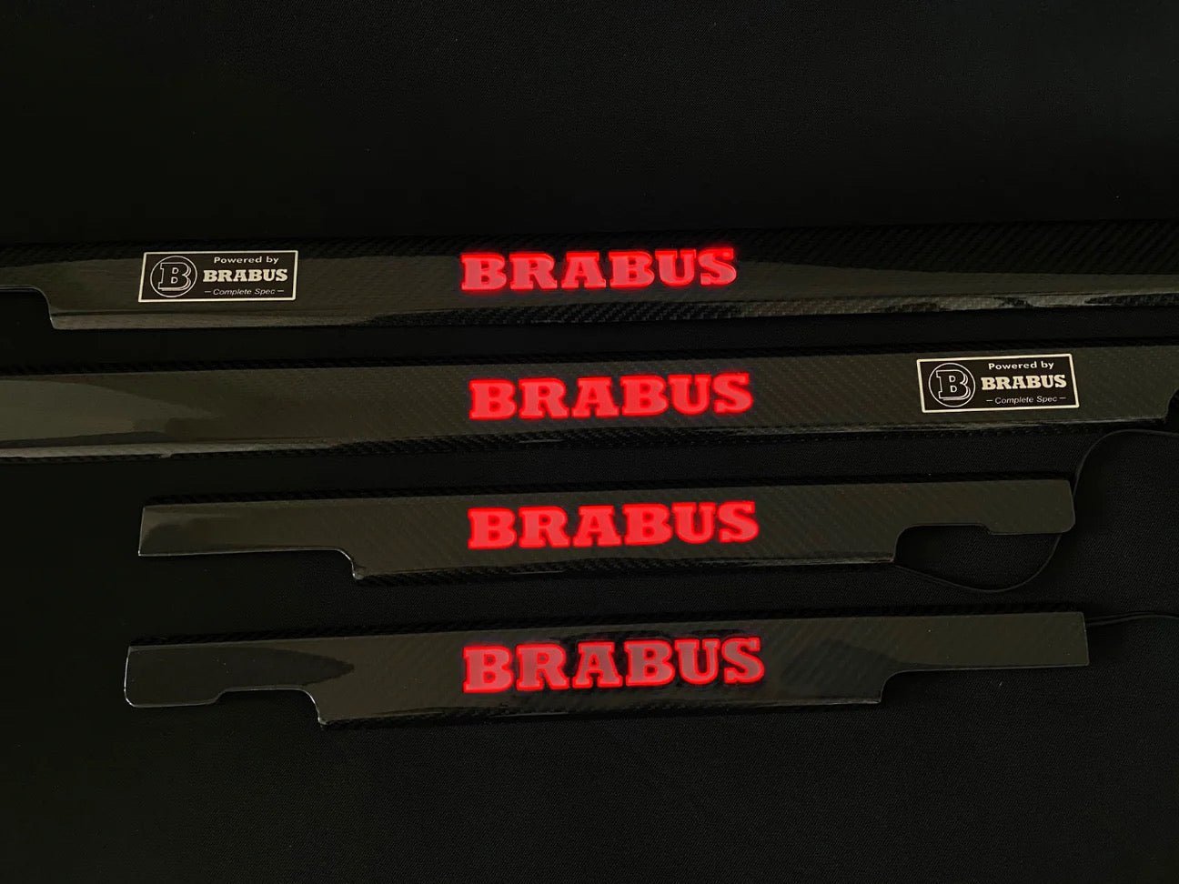 Brabus Door Sills Carbon Red LEDs for Mercedes-Benz G-Class W463, premium carbon fiber finish with illuminated LED logo