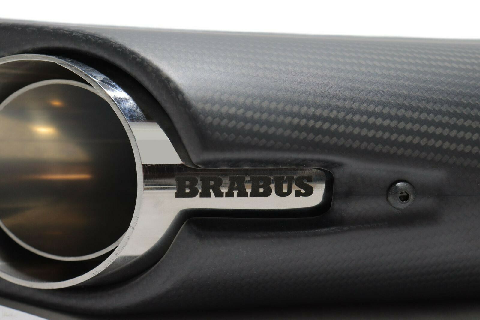 Brabus Rocket Exhaust Pipes Mufflers with LED Illumination for Mercedes-Benz G-Class W463A, crafted from carbon fiber and stainless steel, available in glossy or matte finish.