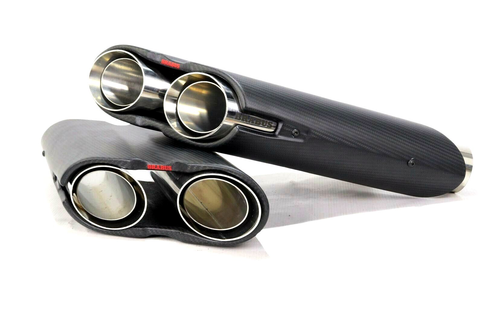 Brabus Rocket Exhaust Pipes Mufflers with LED Illumination for Mercedes-Benz G-Class W463A, crafted from carbon fiber and stainless steel, available in glossy or matte finish.