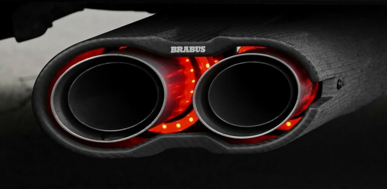 Brabus Rocket Exhaust Pipes Mufflers with LED Illumination for Mercedes-Benz G-Class W463A, crafted from carbon fiber and stainless steel, available in glossy or matte finish.