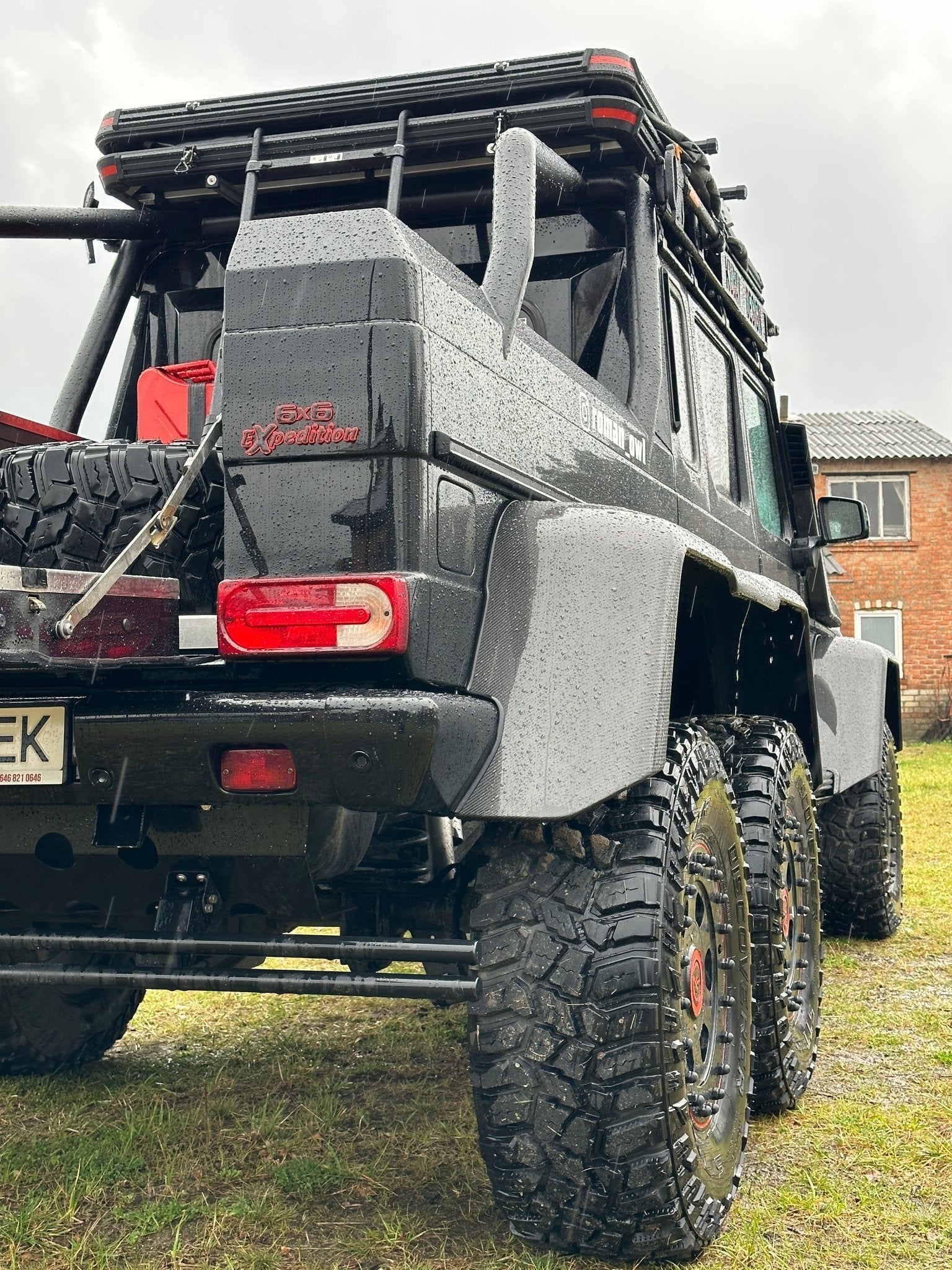 6x6 Expedition Emblem Logo 2-Component Red Metal with Carbon for Mercedes W463 6x6 from Custom Class, high-quality metal and carbon construction.