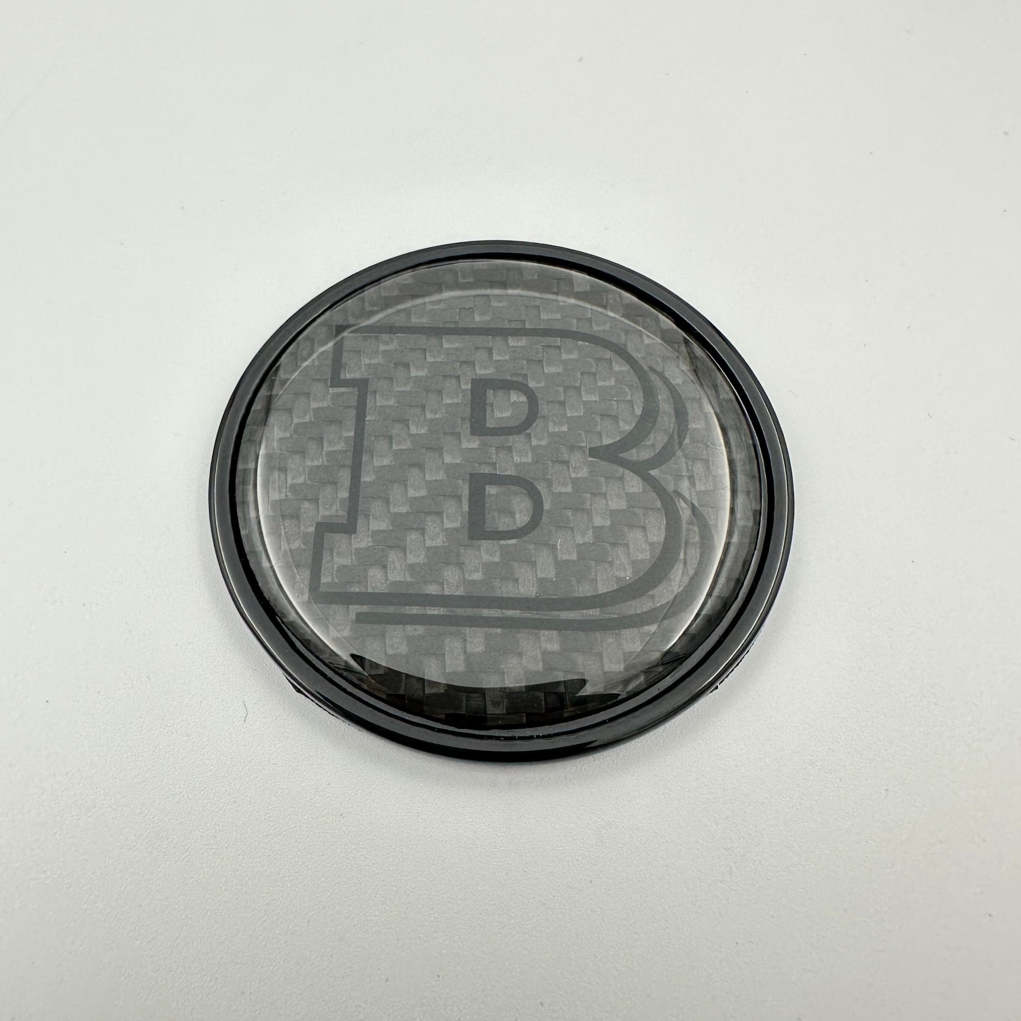 Grey Brabus badge logo emblem 55mm metal + carbon for hood Mercedes-Benz W463 W463A W464 G-Wagon - Custom Class