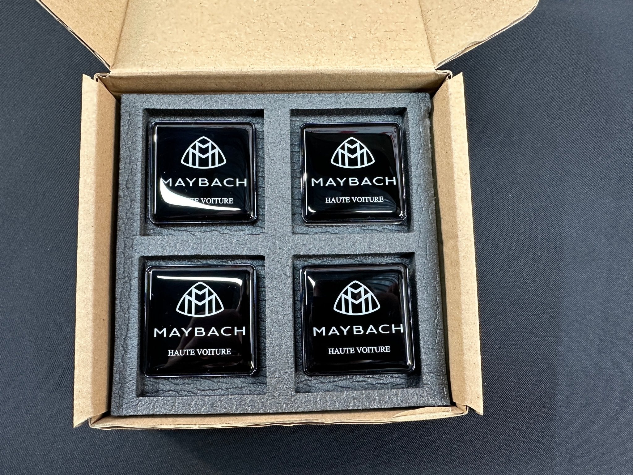 Seats Emblem set in black color with Maybach Haute Voiture logo for Mercedes-Benz - Custom Class