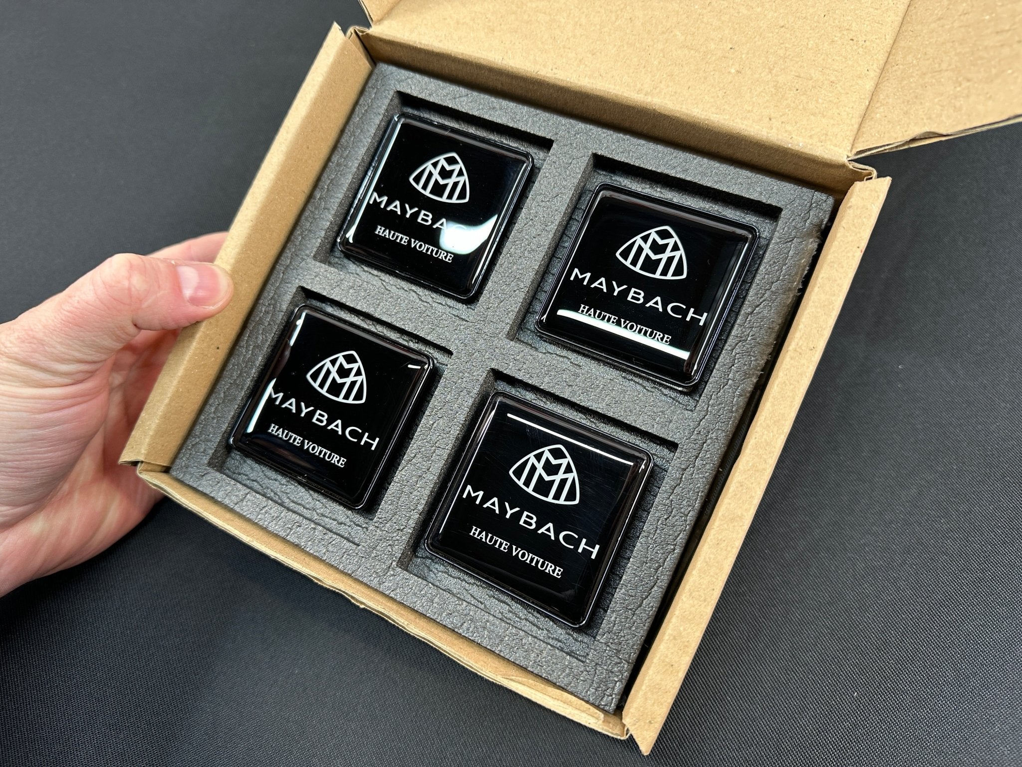 Seats Emblem set in black color with Maybach Haute Voiture logo for Mercedes-Benz - Custom Class