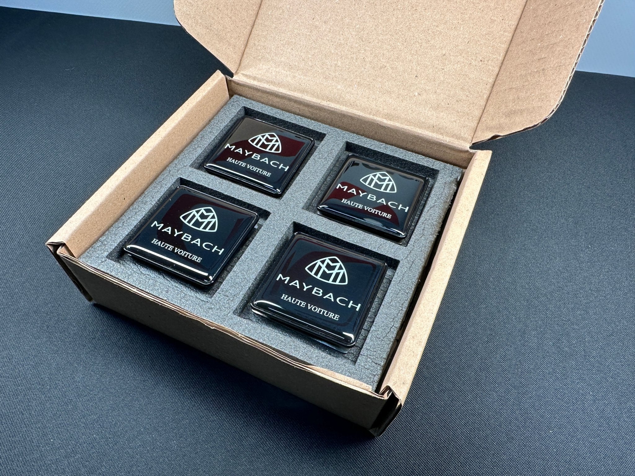 Seats Emblem set in black color with Maybach Haute Voiture logo for Mercedes-Benz - Custom Class