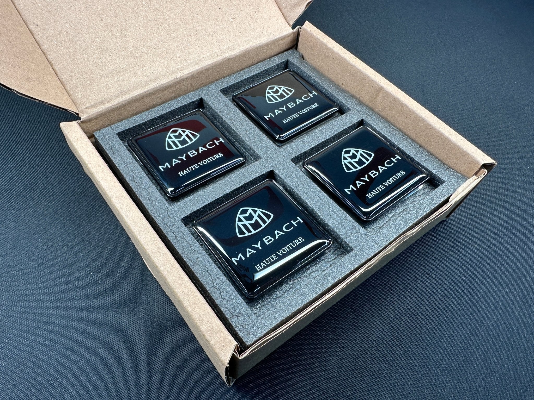 Seats Emblem set in black color with Maybach Haute Voiture logo for Mercedes-Benz - Custom Class