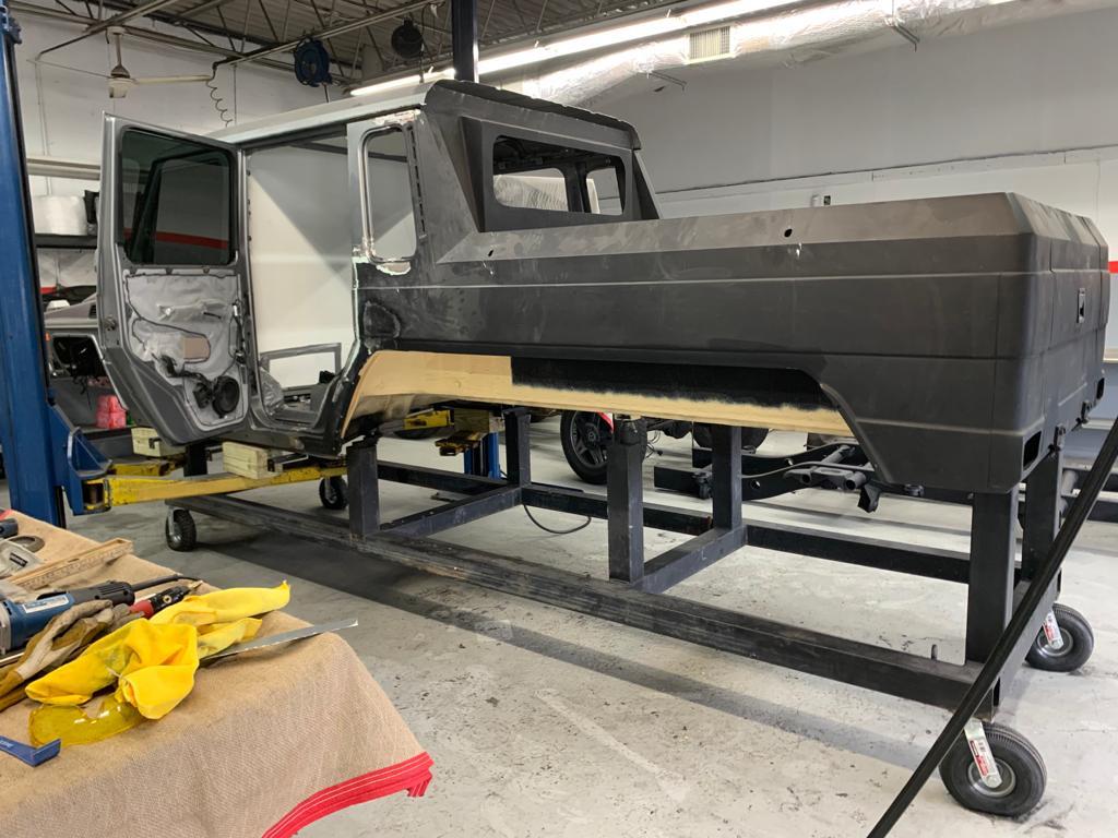 Stainless steel rear pickup body kit for conversion of regular G-Class W463 to 6x6 from Custom Class, includes body, glass, seals, rear door, yacht wood flooring, and body arch.